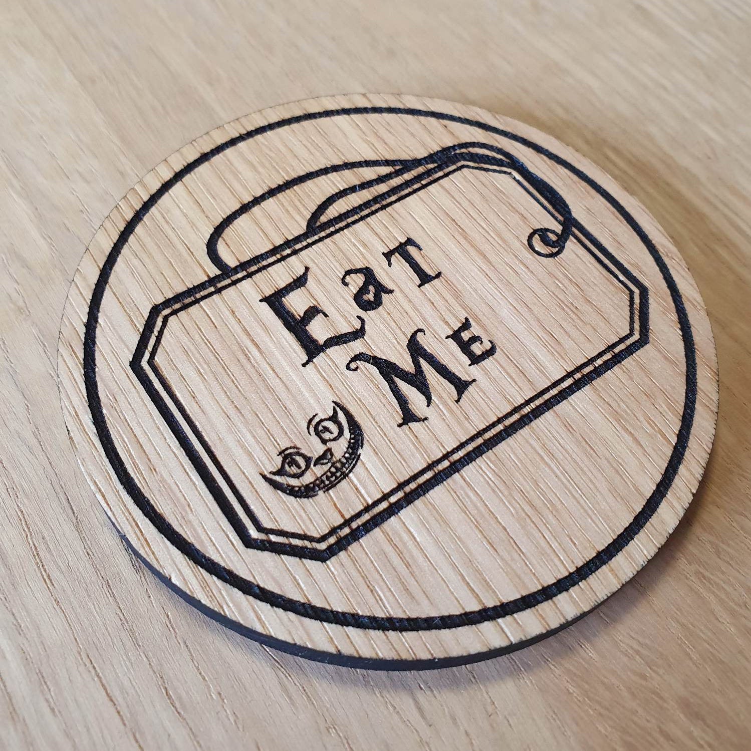 Laser cut wooden coaster personalised. Alice Eat Me