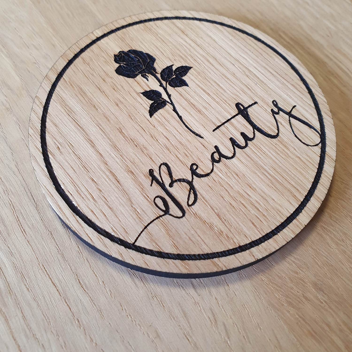 Laser cut wooden coaster personalised. Beast Beauty Double Deal