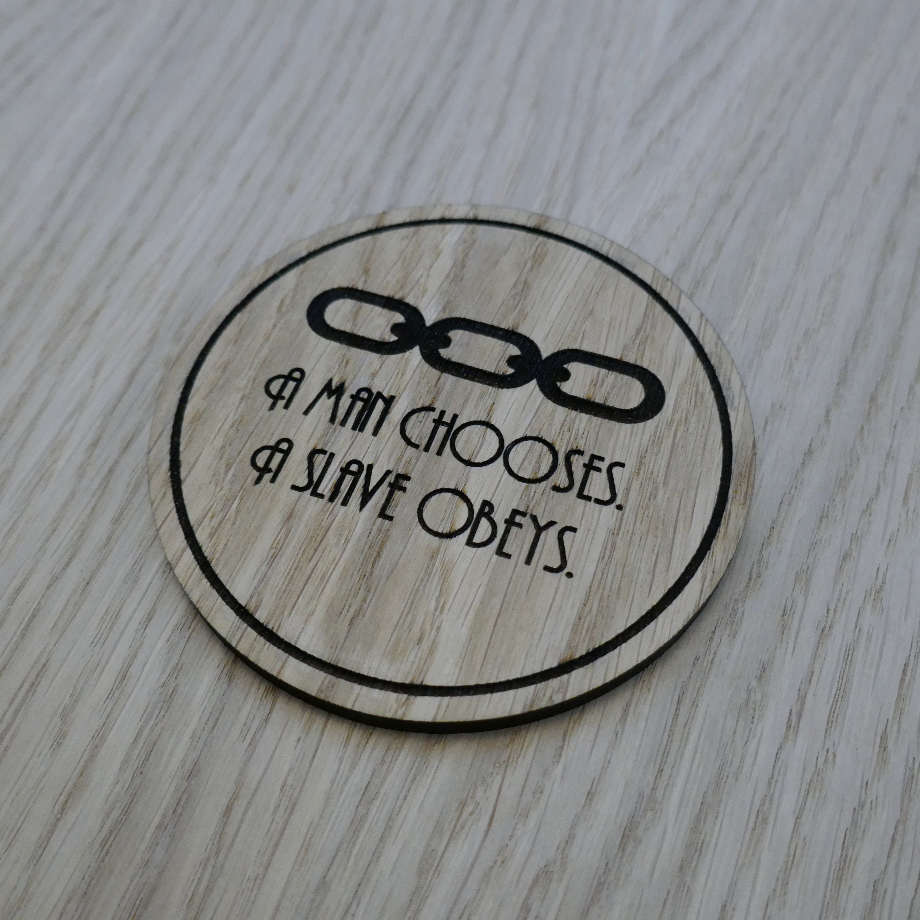 Laser cut wooden coaster personalised. A man chooses, a slave obeys