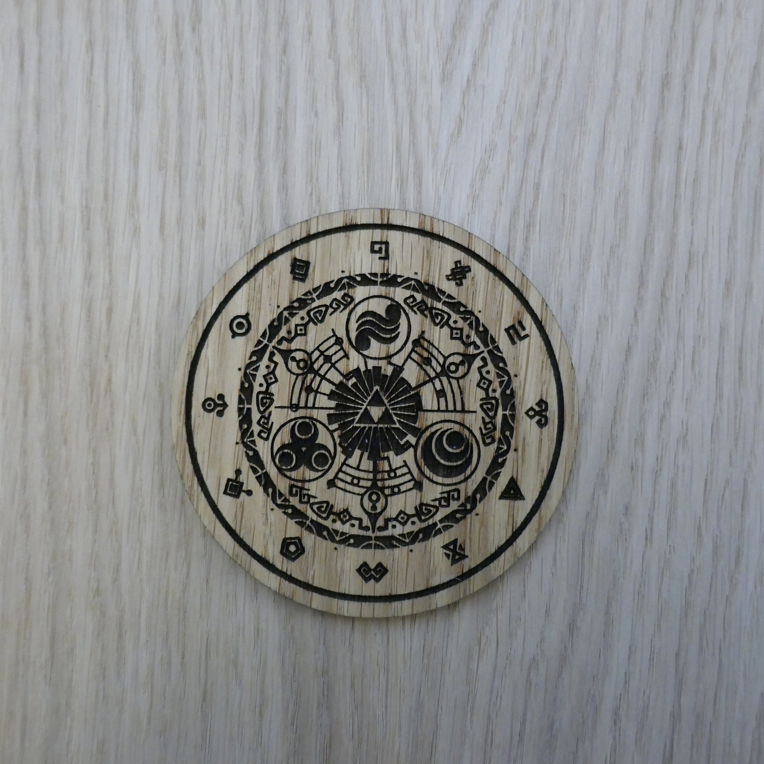 Laser cut wooden coaster personalised. Legend Link Circular Design