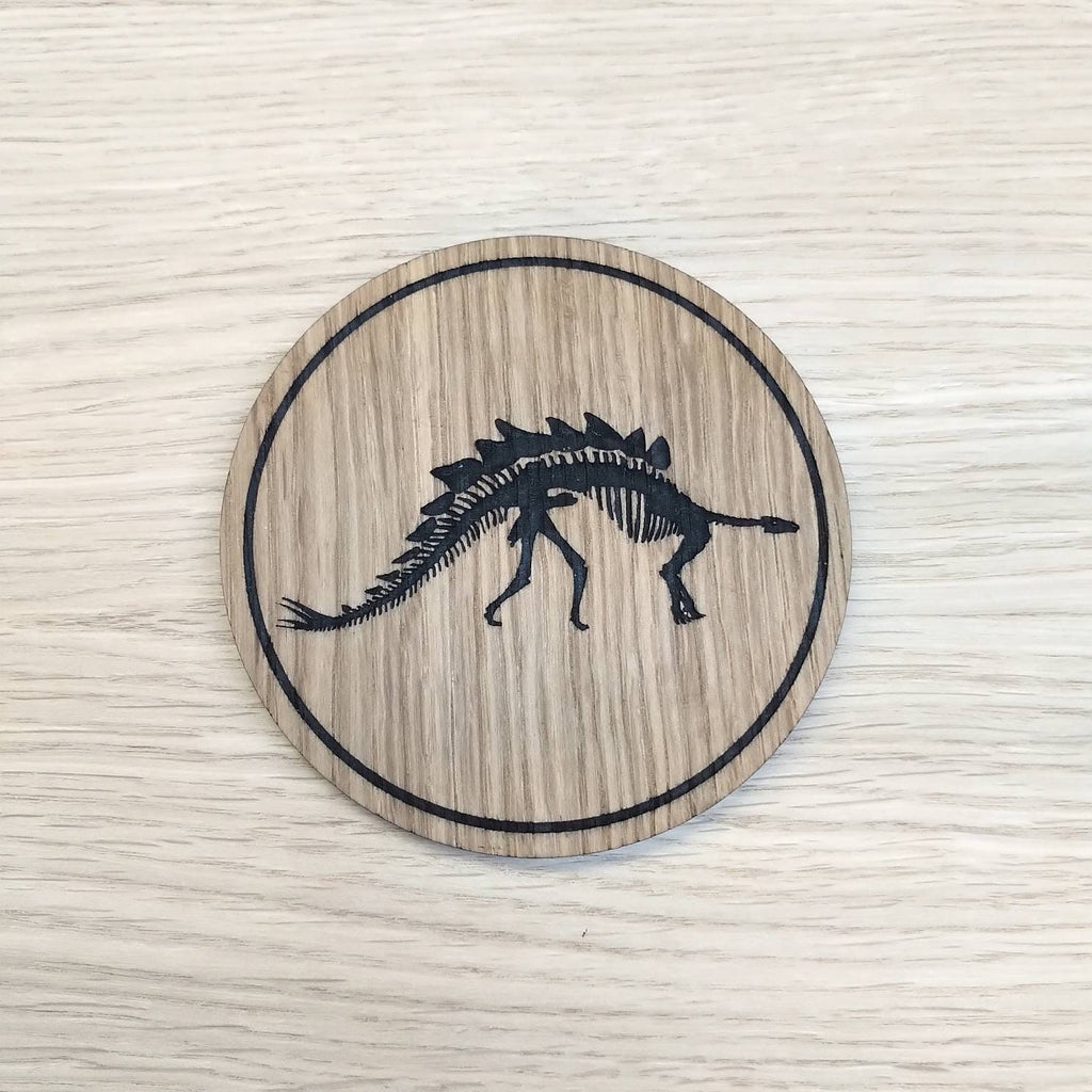 Laser cut wooden coaster personalised. Stegosaurus Dinosaur Skeleton Fossil