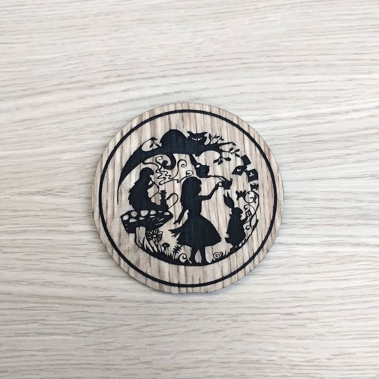 Laser cut wooden coaster personalised. Alice Madness Tea Party