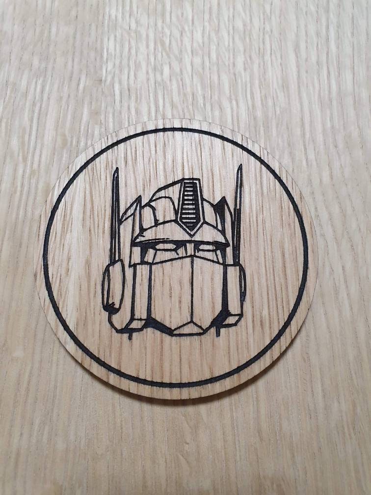 Laser cut wooden coaster personalised. Leader 1980s cartoon