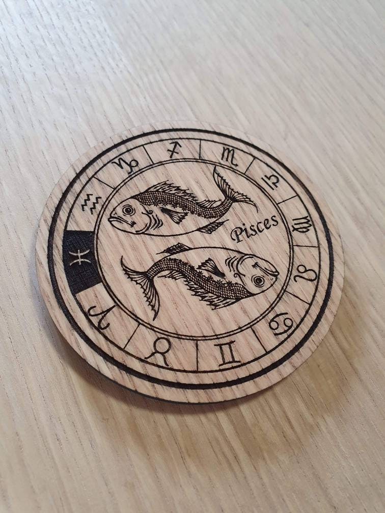 Laser cut wooden coaster personalised. Signs of the zodiac Pisces star sign