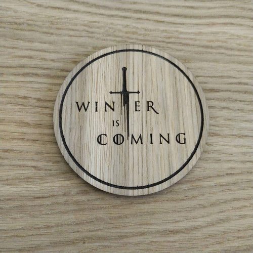Laser cut wooden coaster. winter sword quote