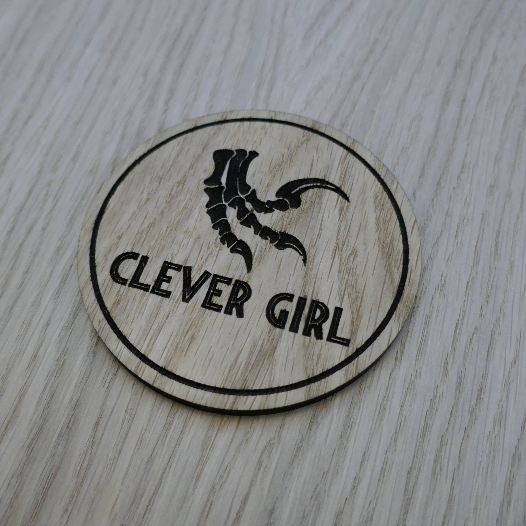 Laser cut wooden coaster personalised. clever girl raptor claw