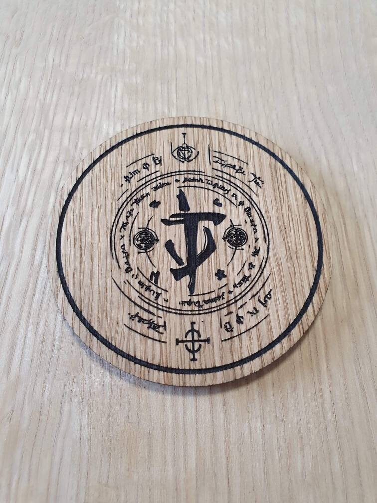 Laser cut wooden coaster personalised. eternal preator coin