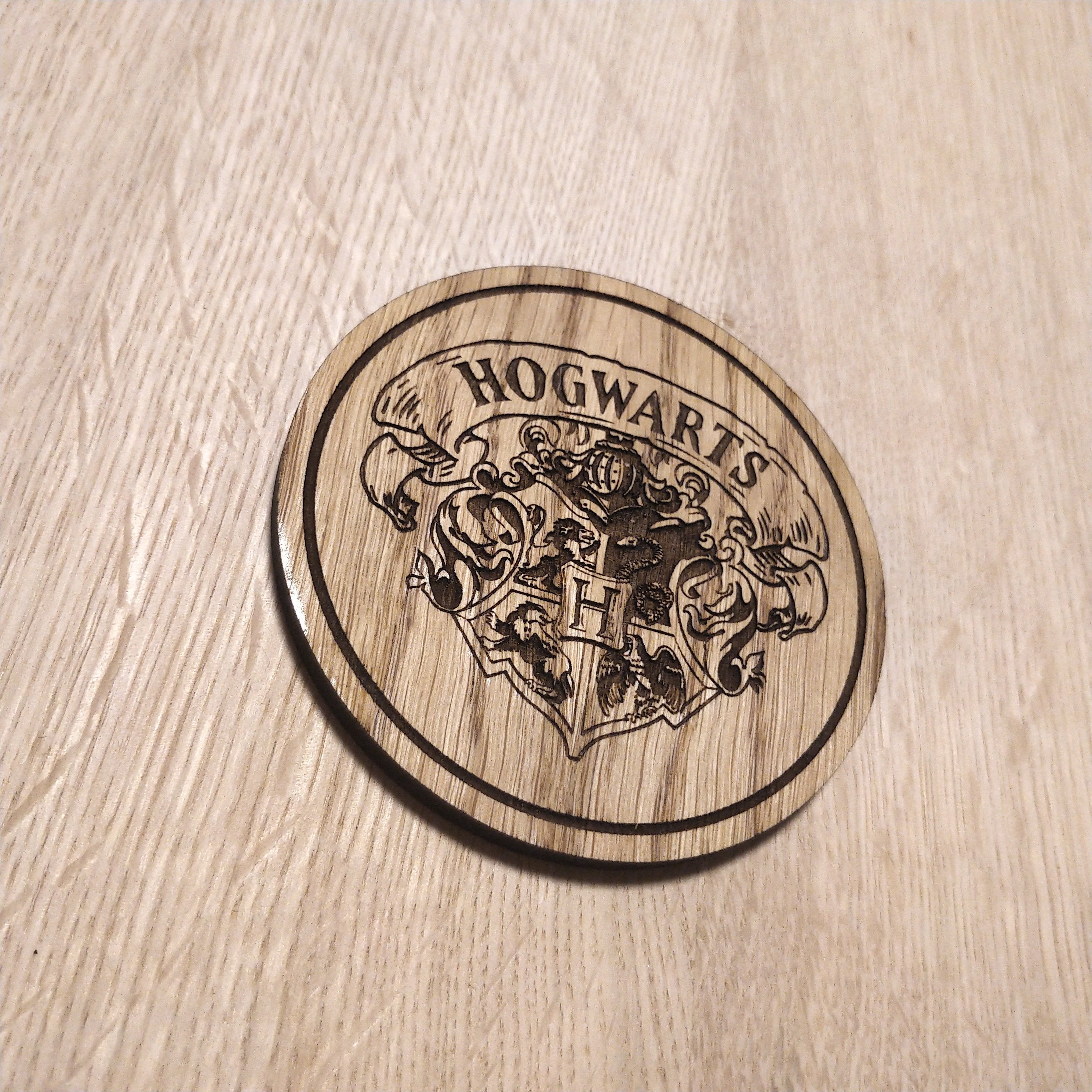 Laser cut wooden coaster. Wizard school