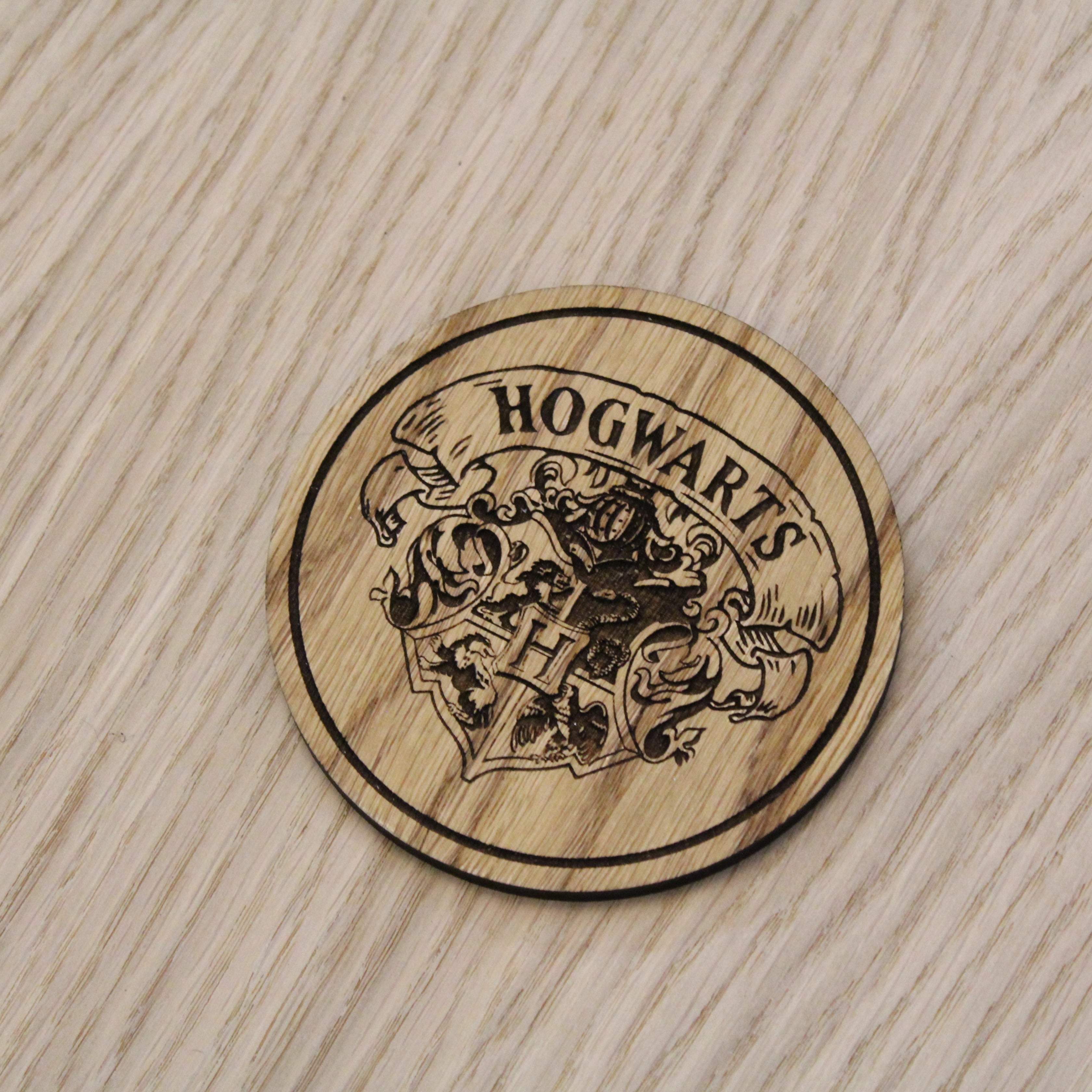 Laser cut wooden coaster. Wizard school