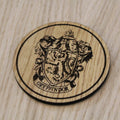 Laser cut wooden coaster. gryff indor