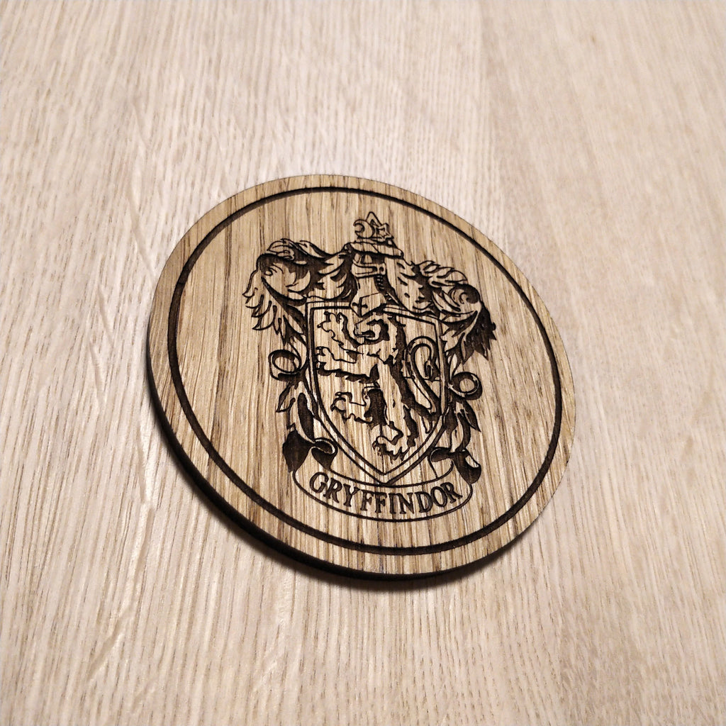 Laser cut wooden coaster. gryff indor