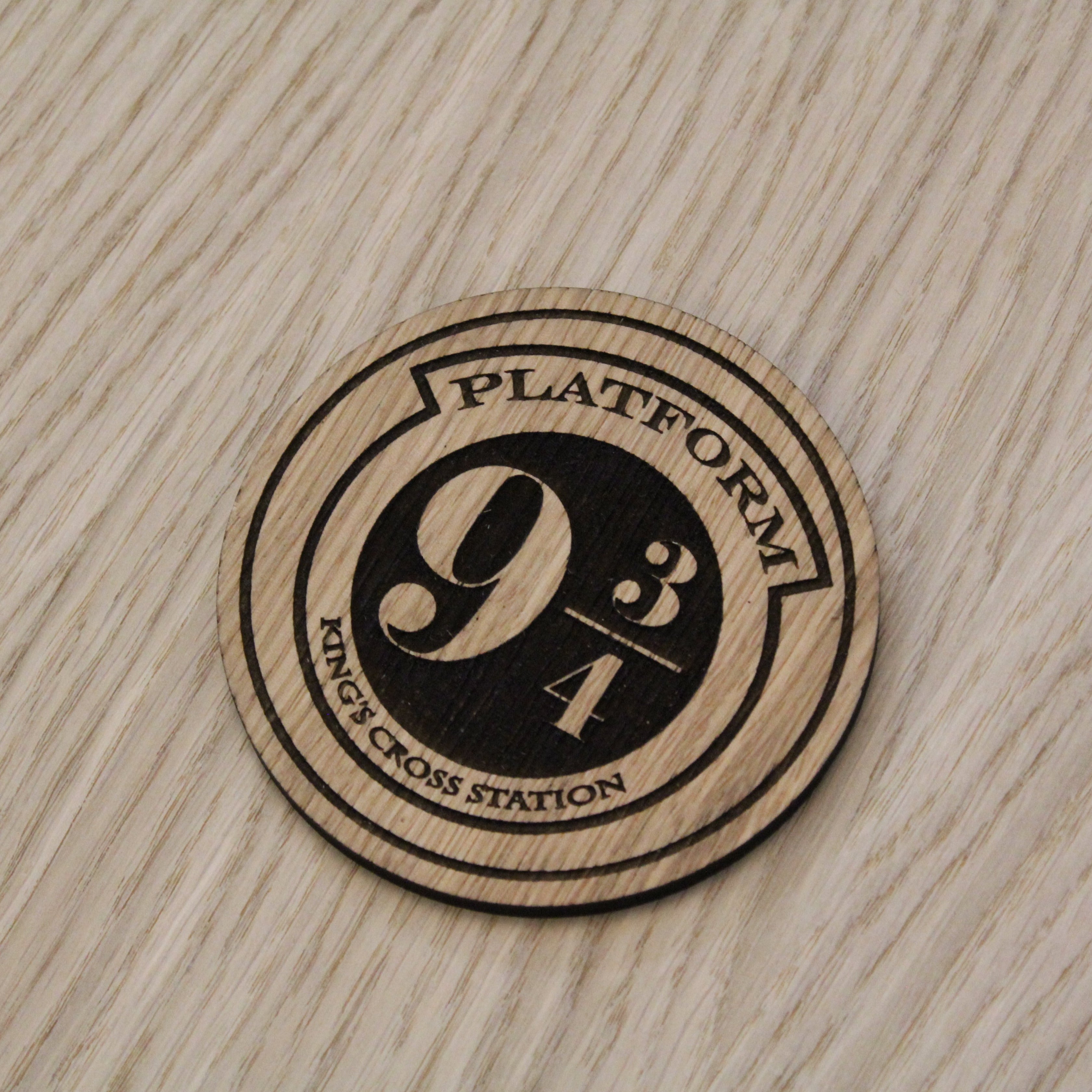 Laser cut wooden coaster. train station