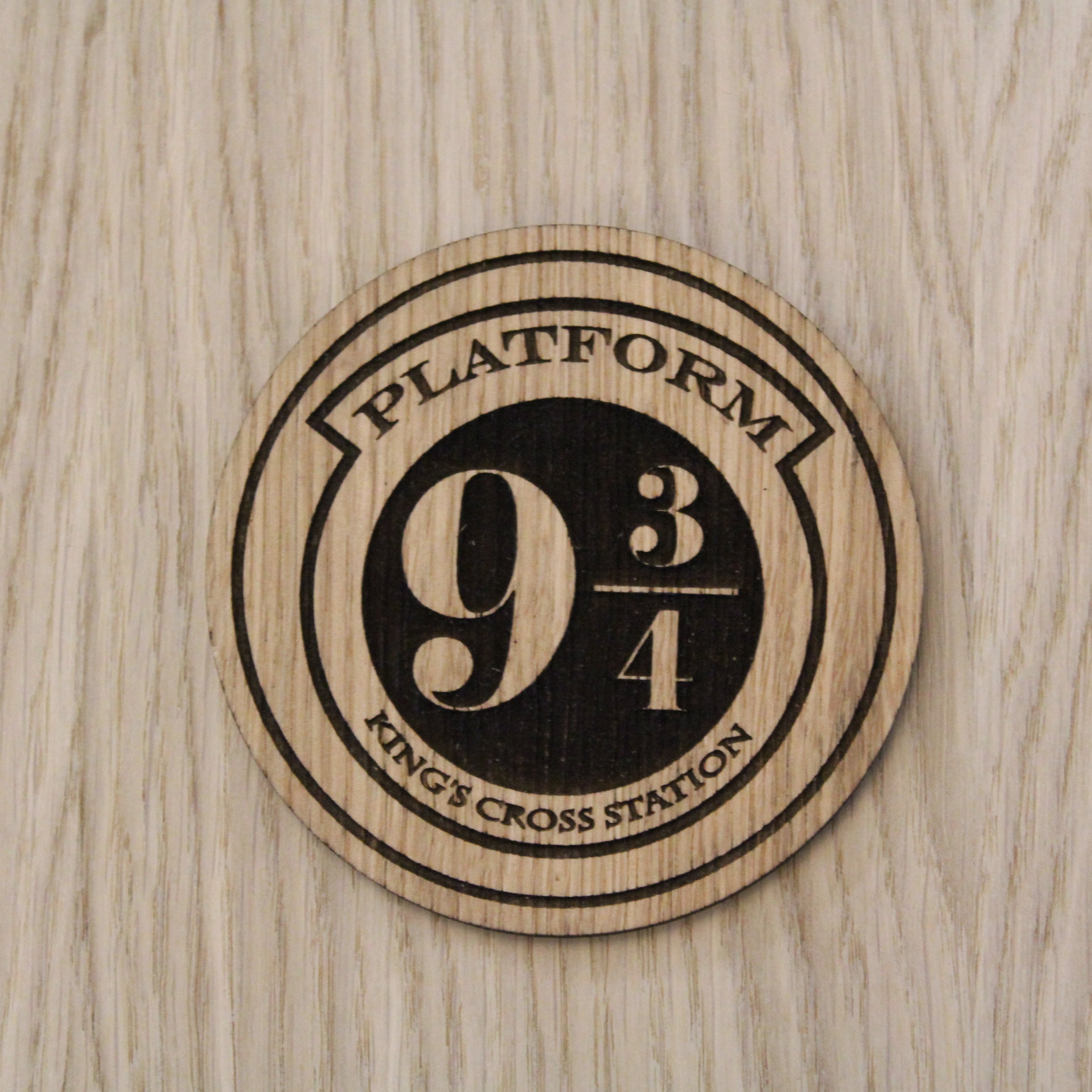 Laser cut wooden coaster. train station
