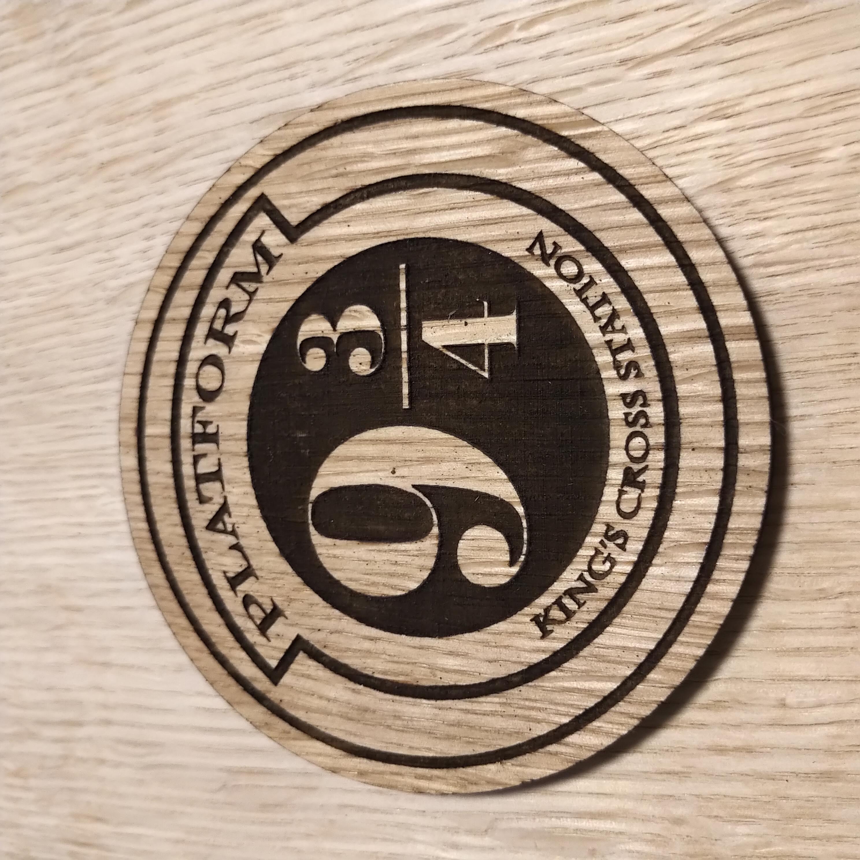 Laser cut wooden coaster. train station