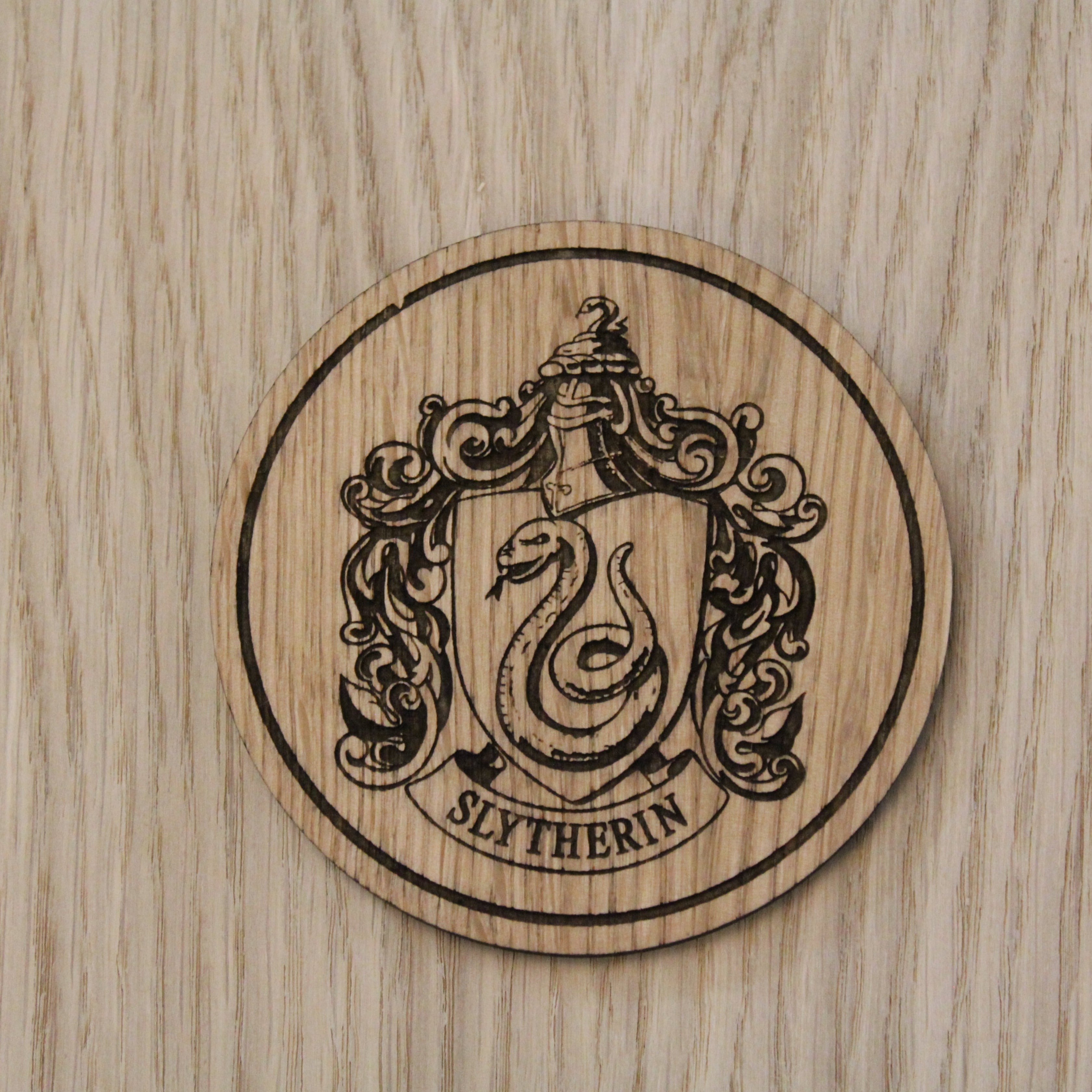Laser cut wooden coaster. Slytherin