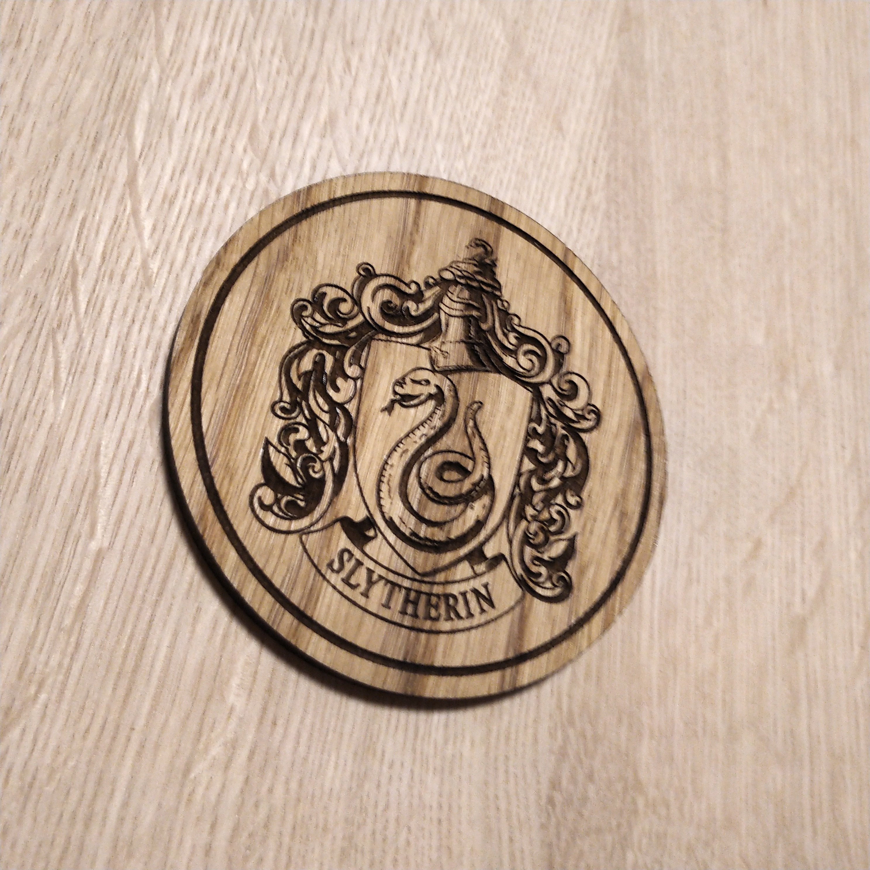 Laser cut wooden coaster. Slytherin