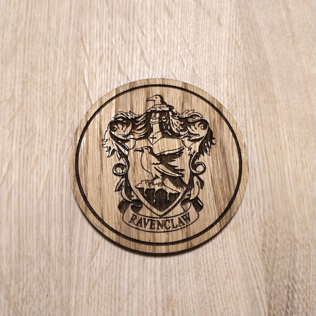 Laser cut wooden coaster. Raven claw