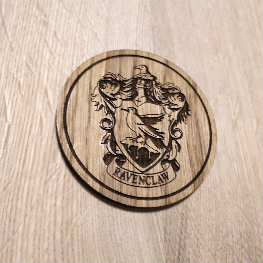 Laser cut wooden coaster. Raven claw