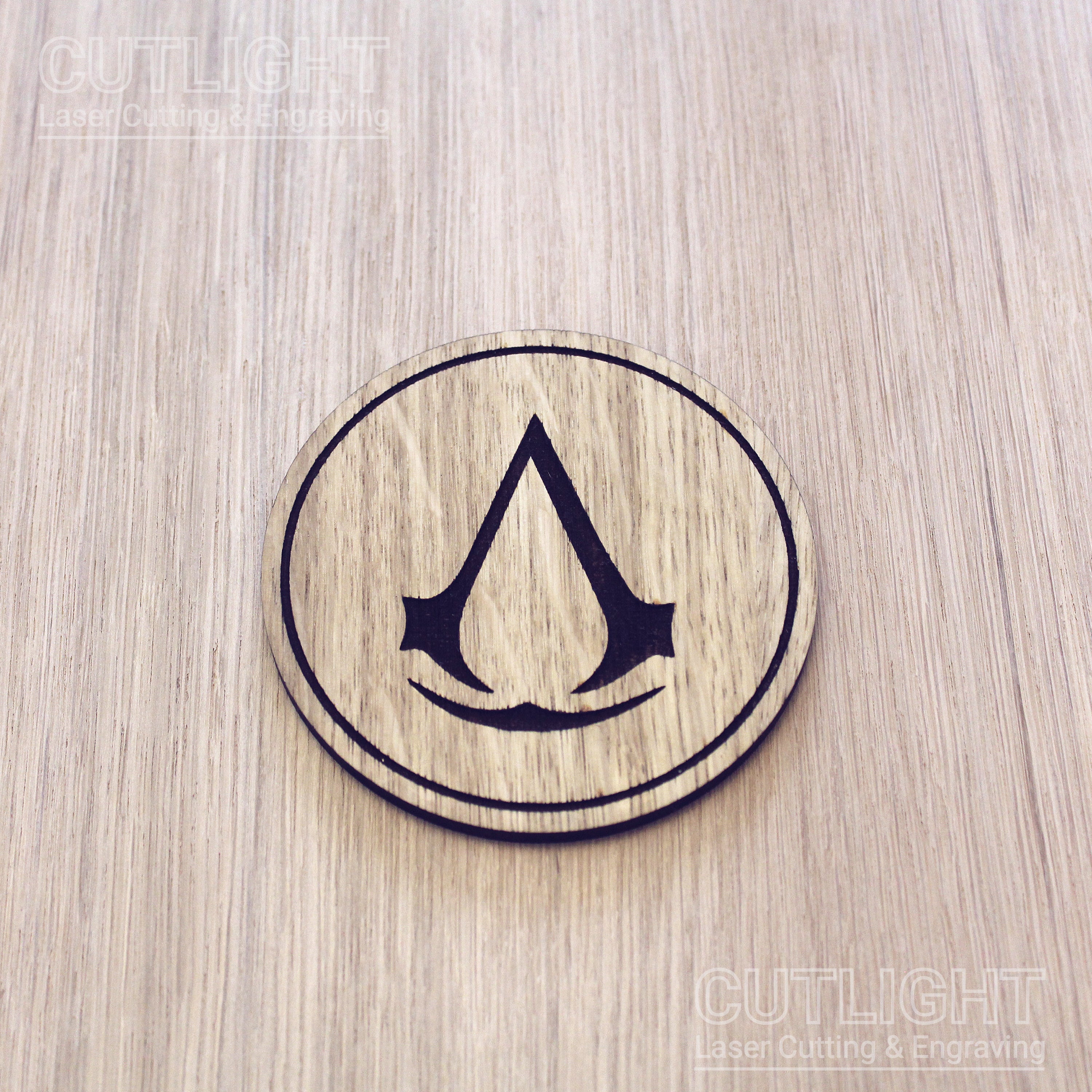 Laser cut wooden coaster. Creed