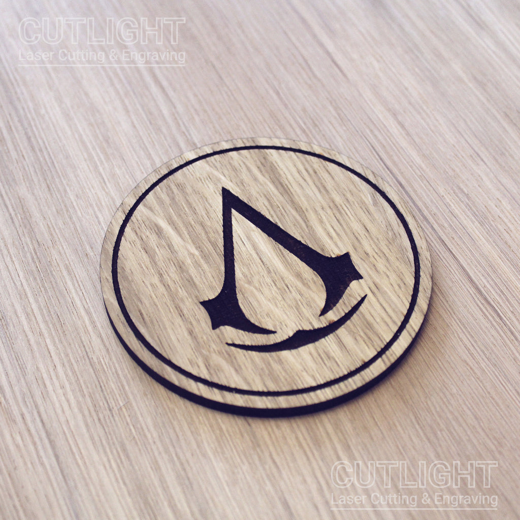 Laser cut wooden coaster. Creed