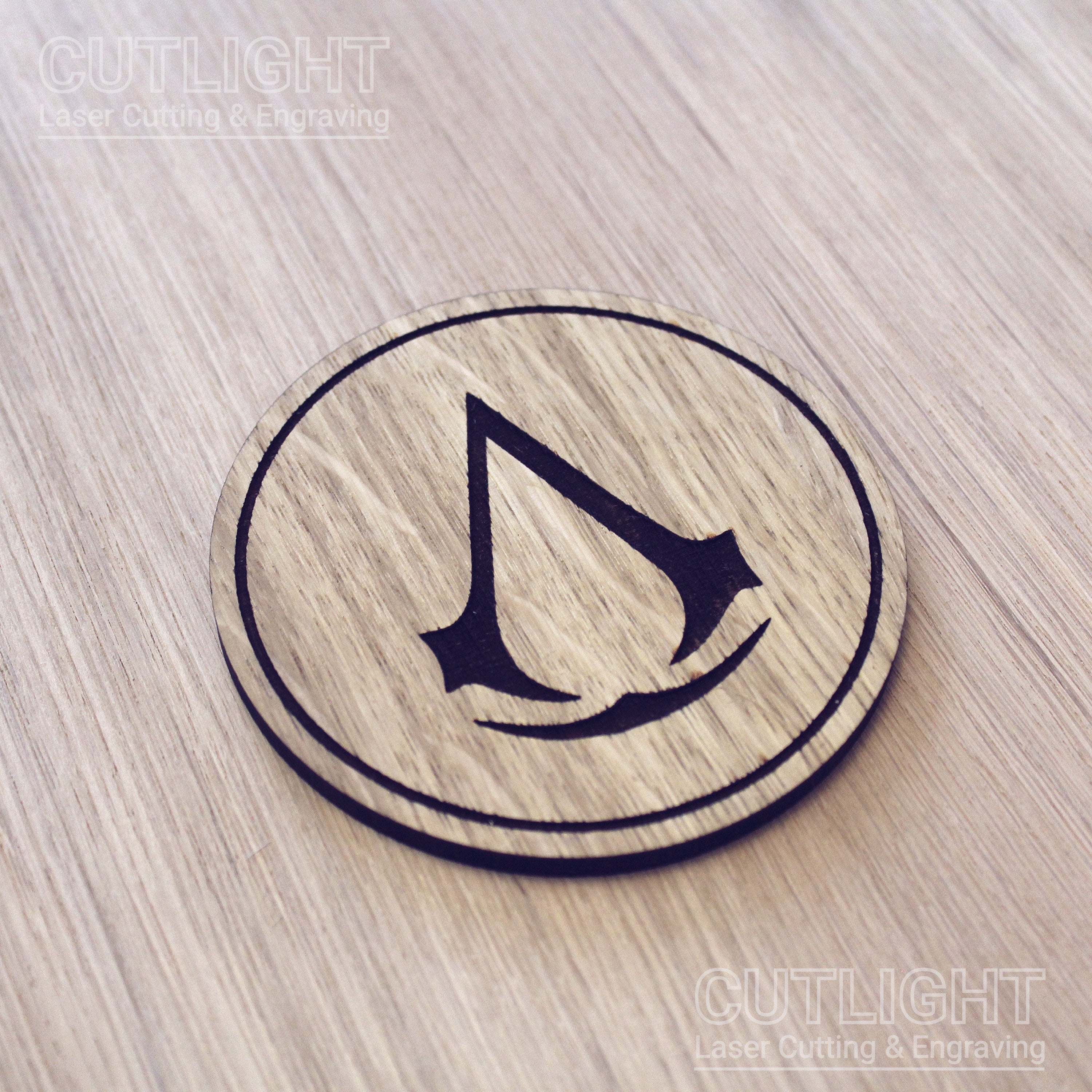 Laser cut wooden coaster. Creed