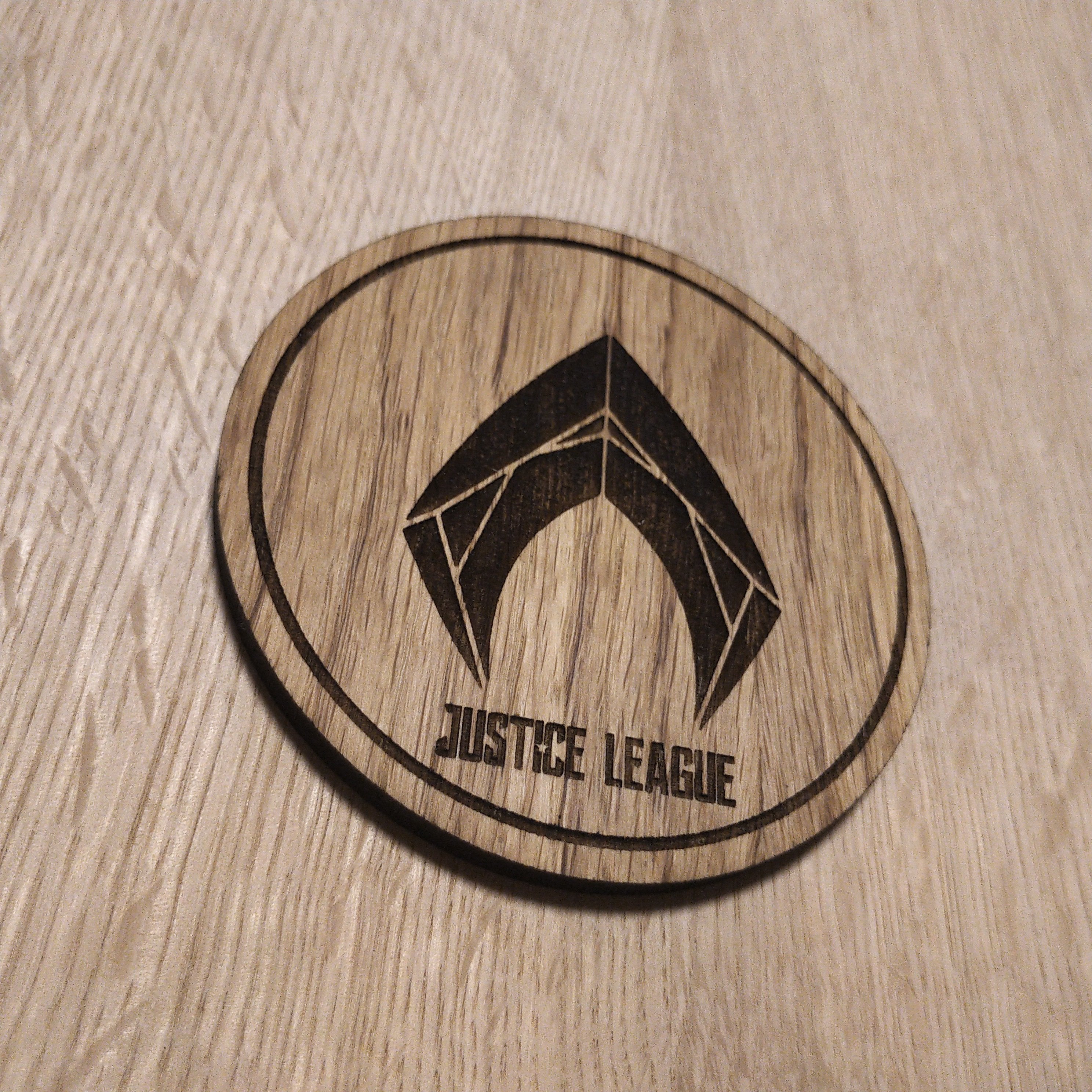 Laser cut wooden coaster. Aquaman