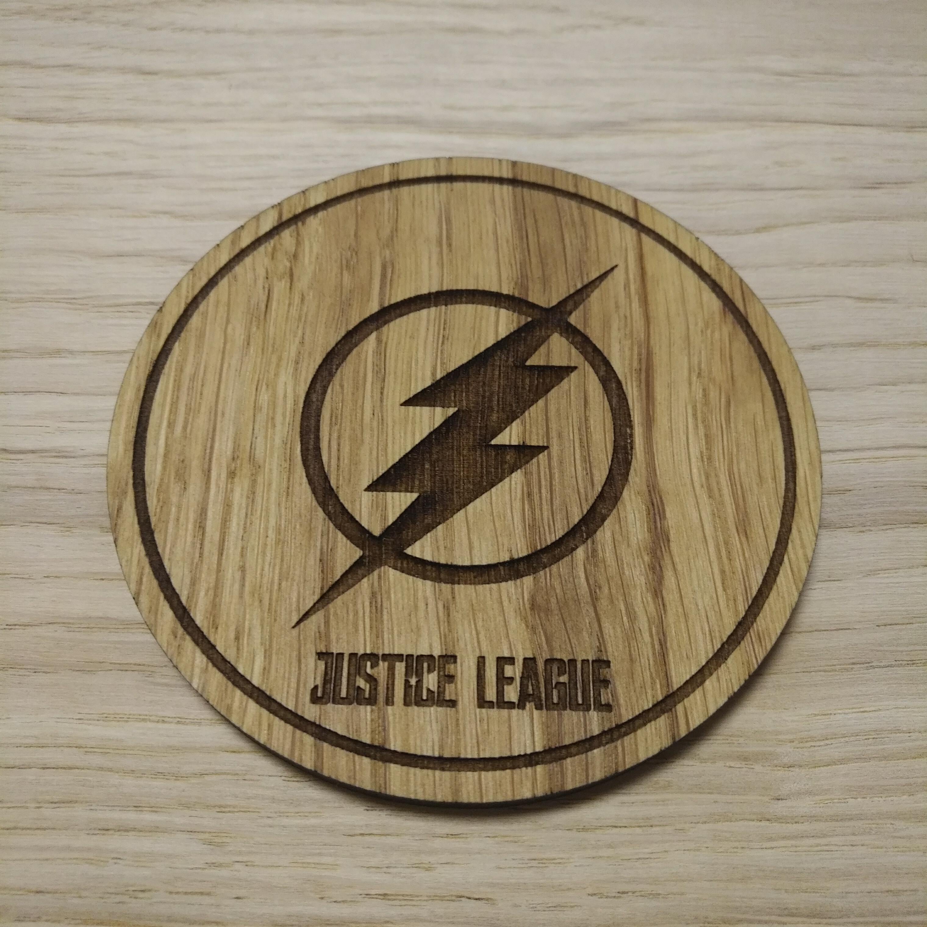 Laser cut wooden coaster. Flash