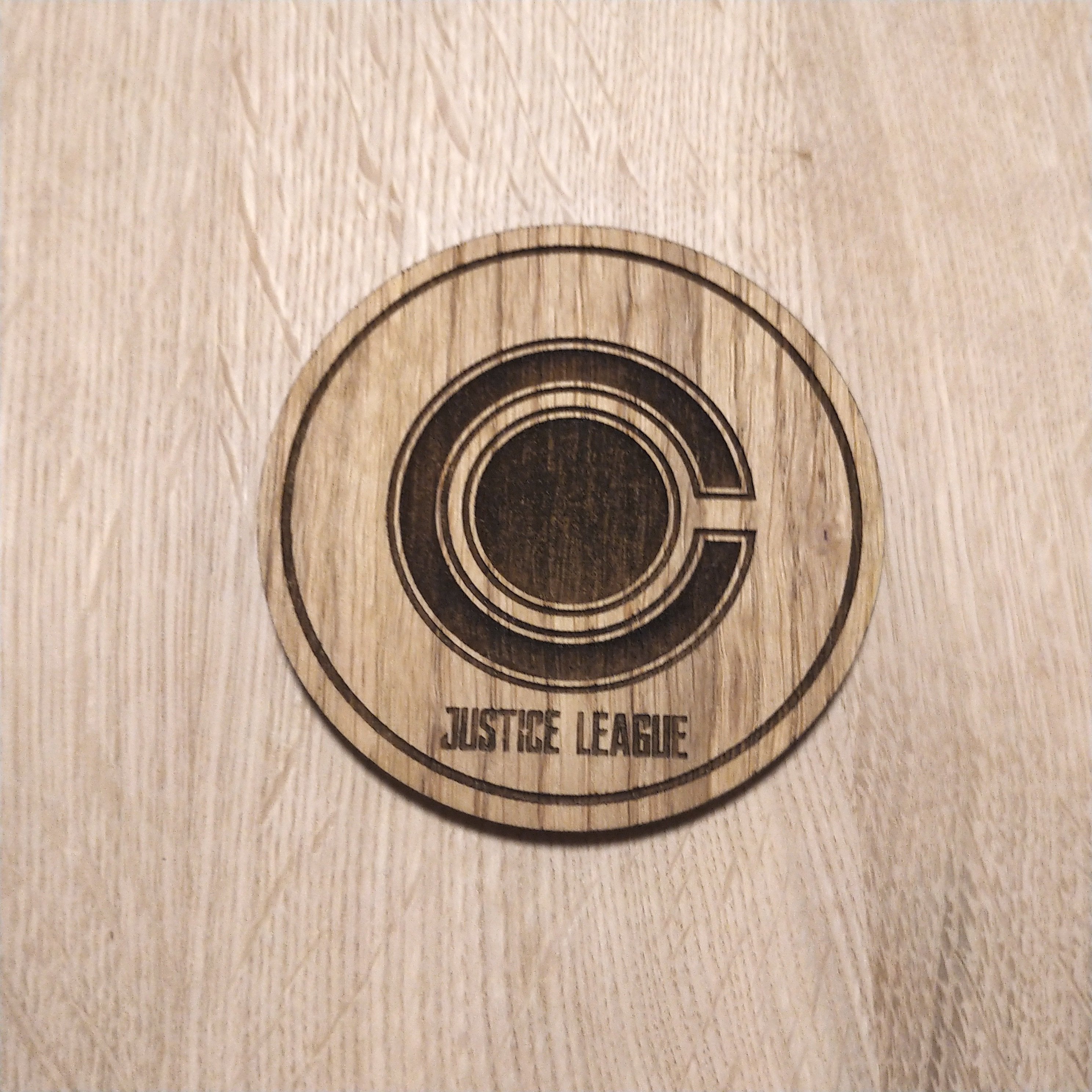 Laser cut wooden coaster. Cyborg