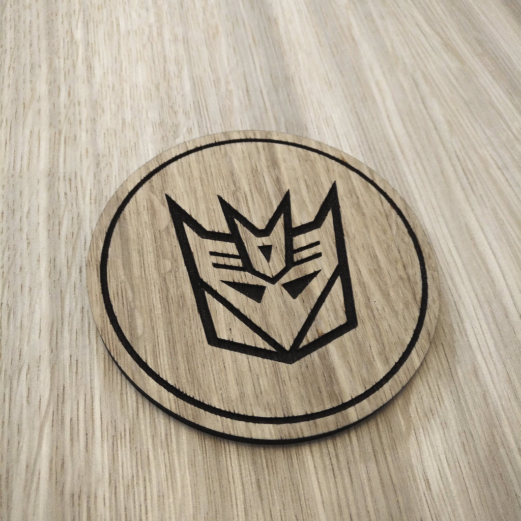 Laser cut wooden coaster. Deception 1980s cartoon