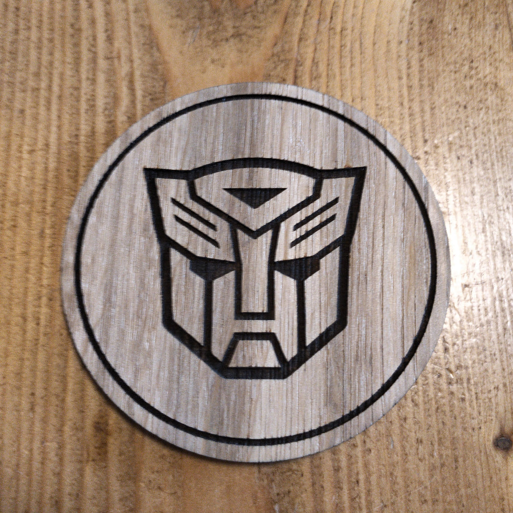 Laser cut wooden coaster. Autobot 1980s cartoon