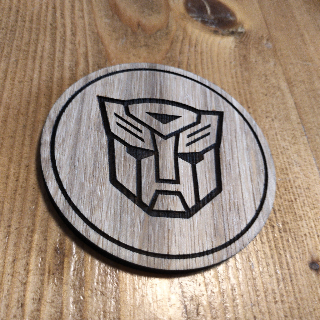 Laser cut wooden coaster. Autobot 1980s cartoon