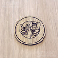 Laser cut wooden coaster. Simpsons Duff Beer cartoon