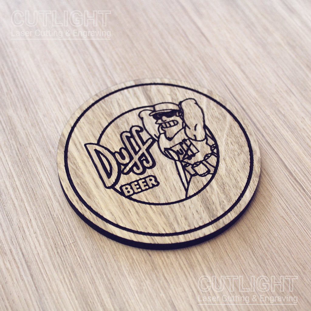 Laser cut wooden coaster. Simpsons Duff Beer cartoon