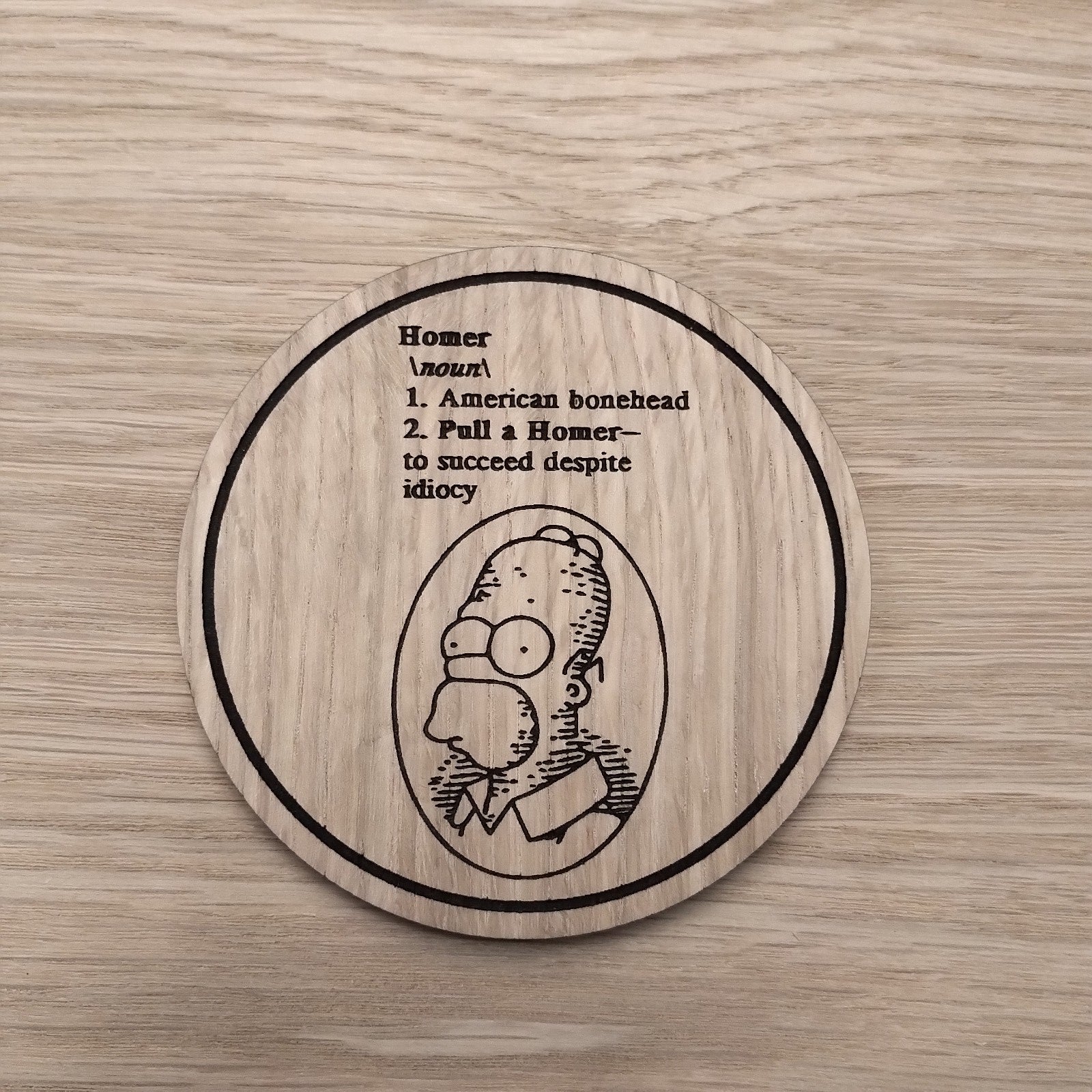 Laser cut wooden coaster personalised. homer definition