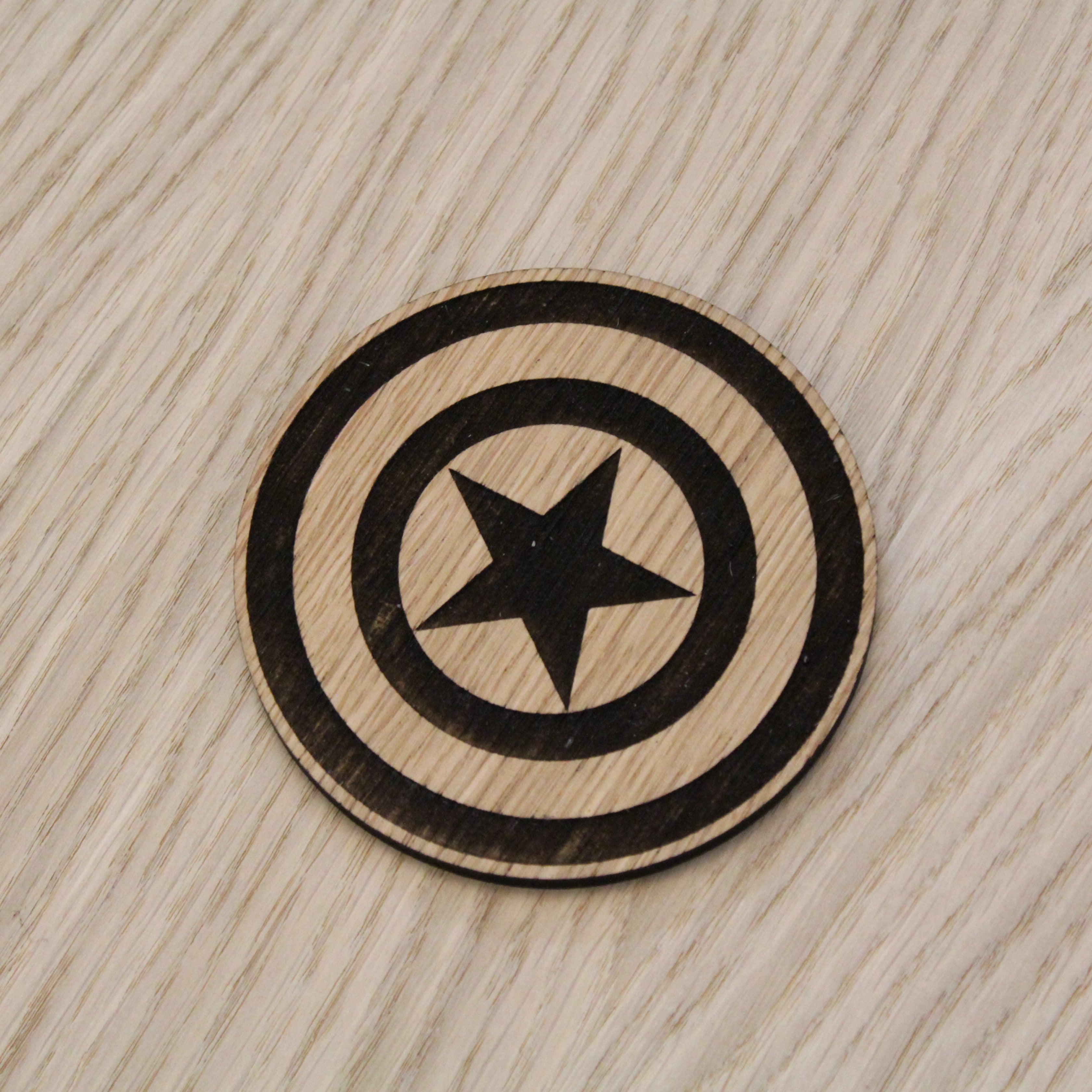Laser cut wooden coaster. America Shield