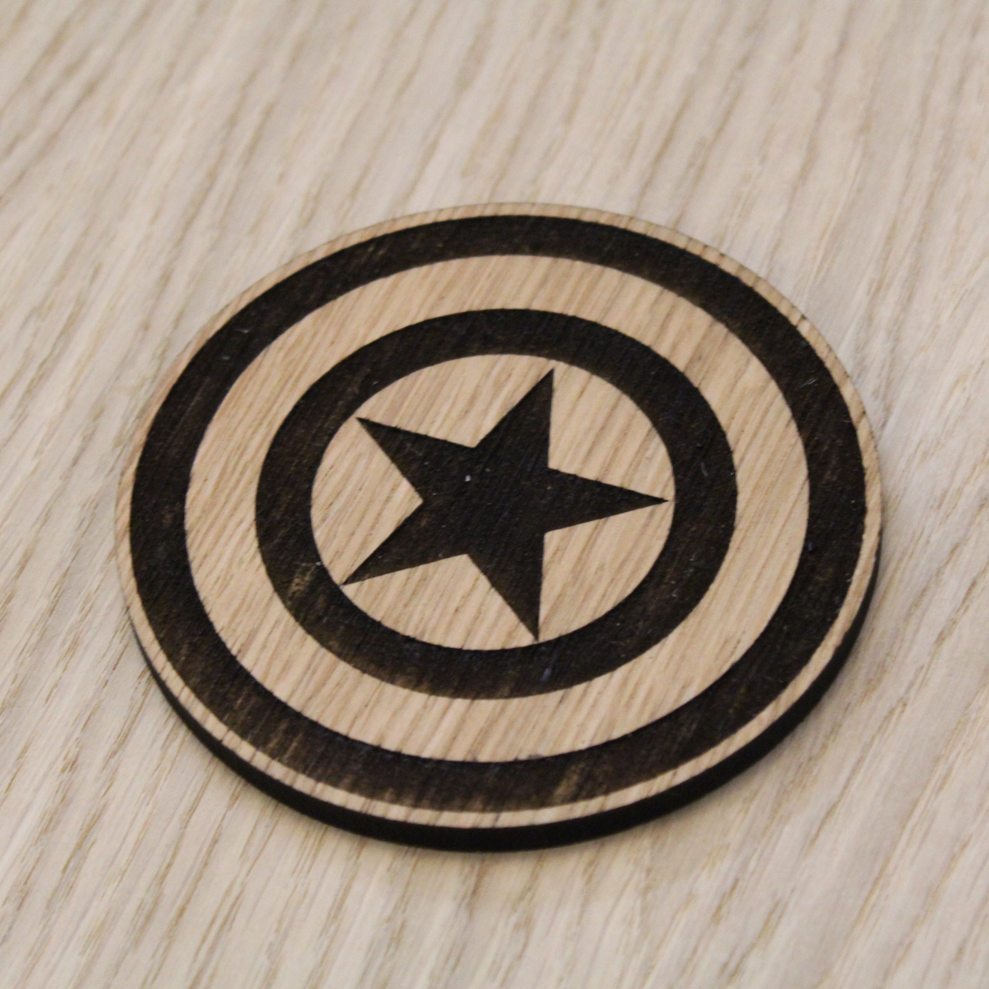 Laser cut wooden coaster. America Shield
