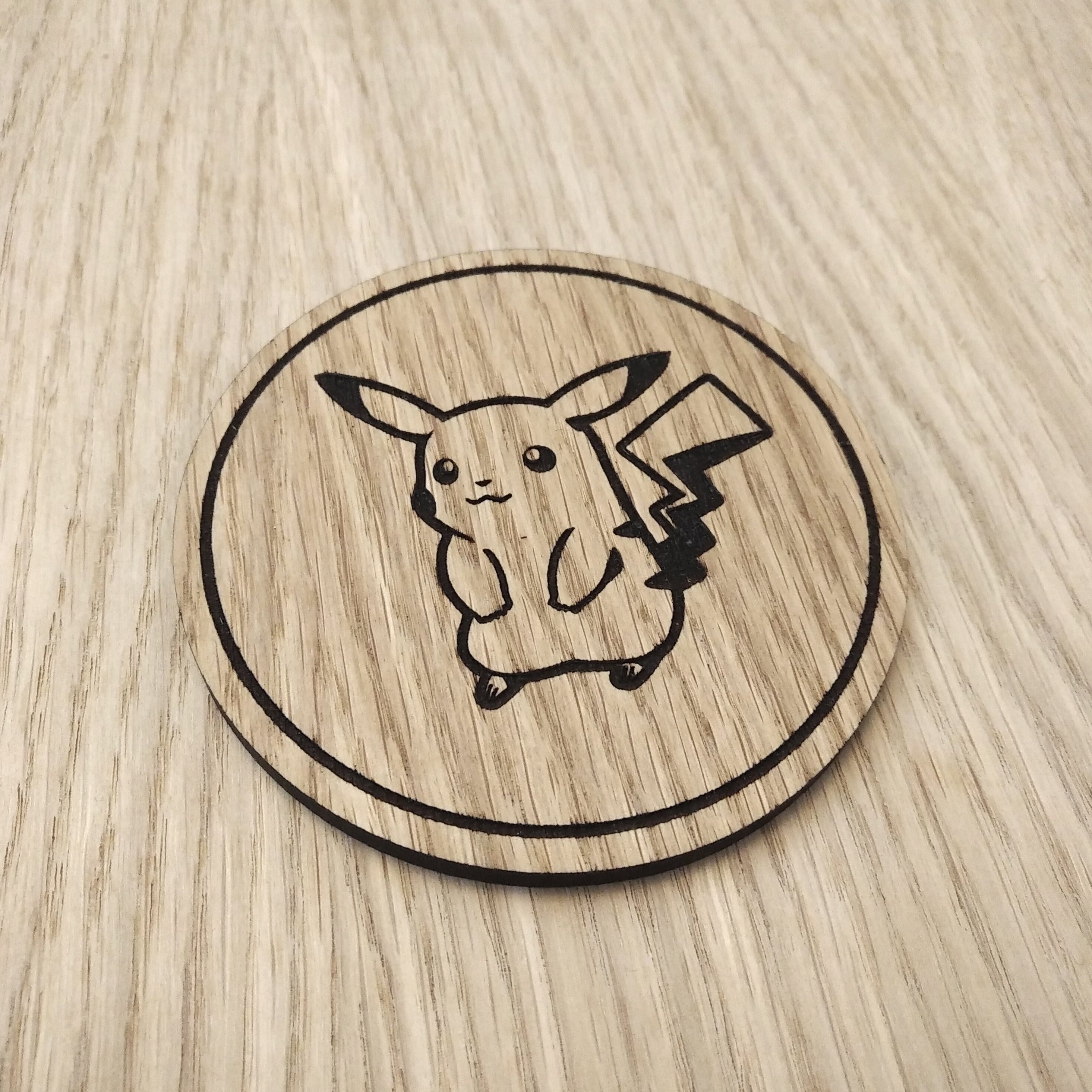 Laser cut wooden coaster. Pika