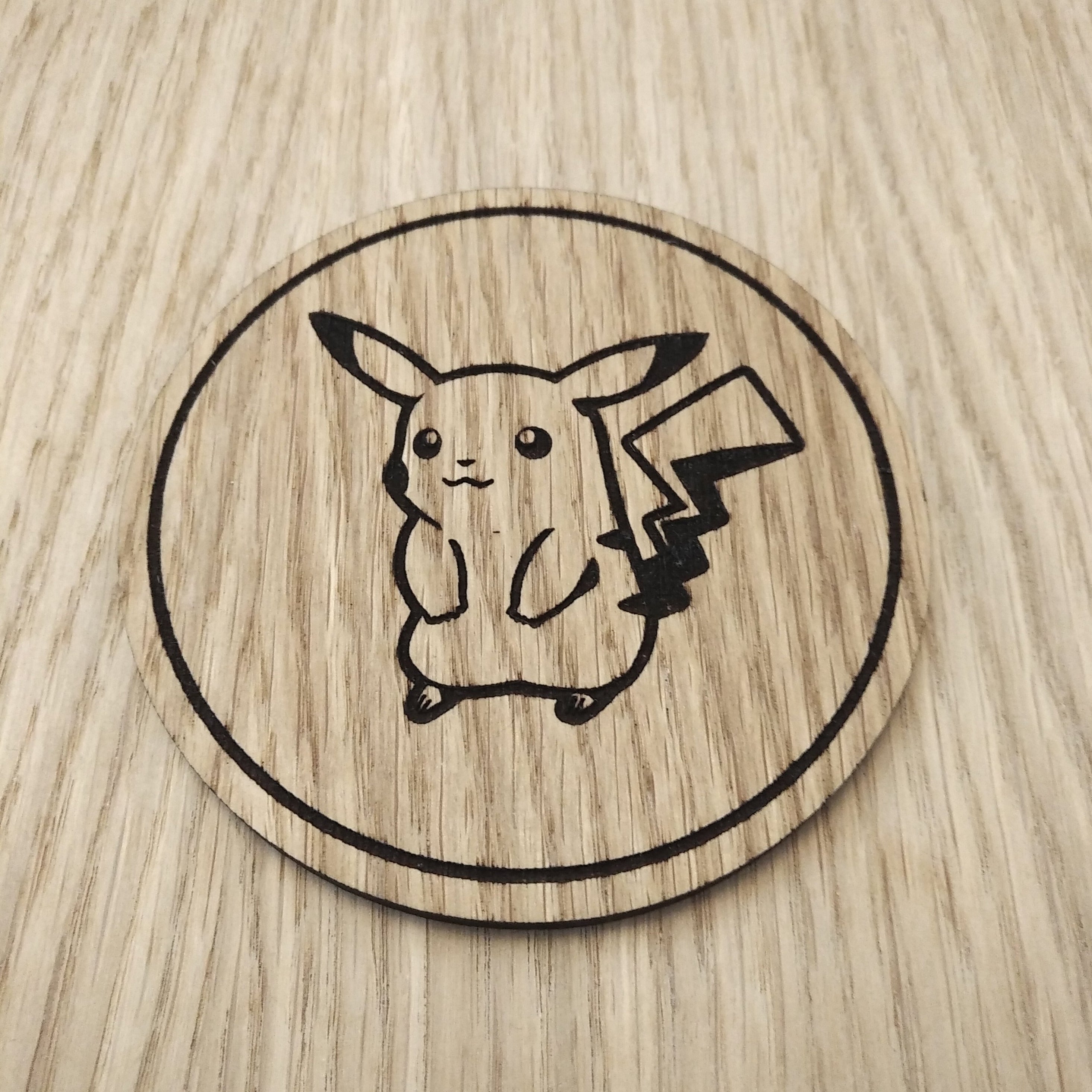 Laser cut wooden coaster. Pika