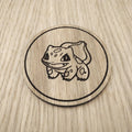 Laser cut wooden coaster. Bulbasaur