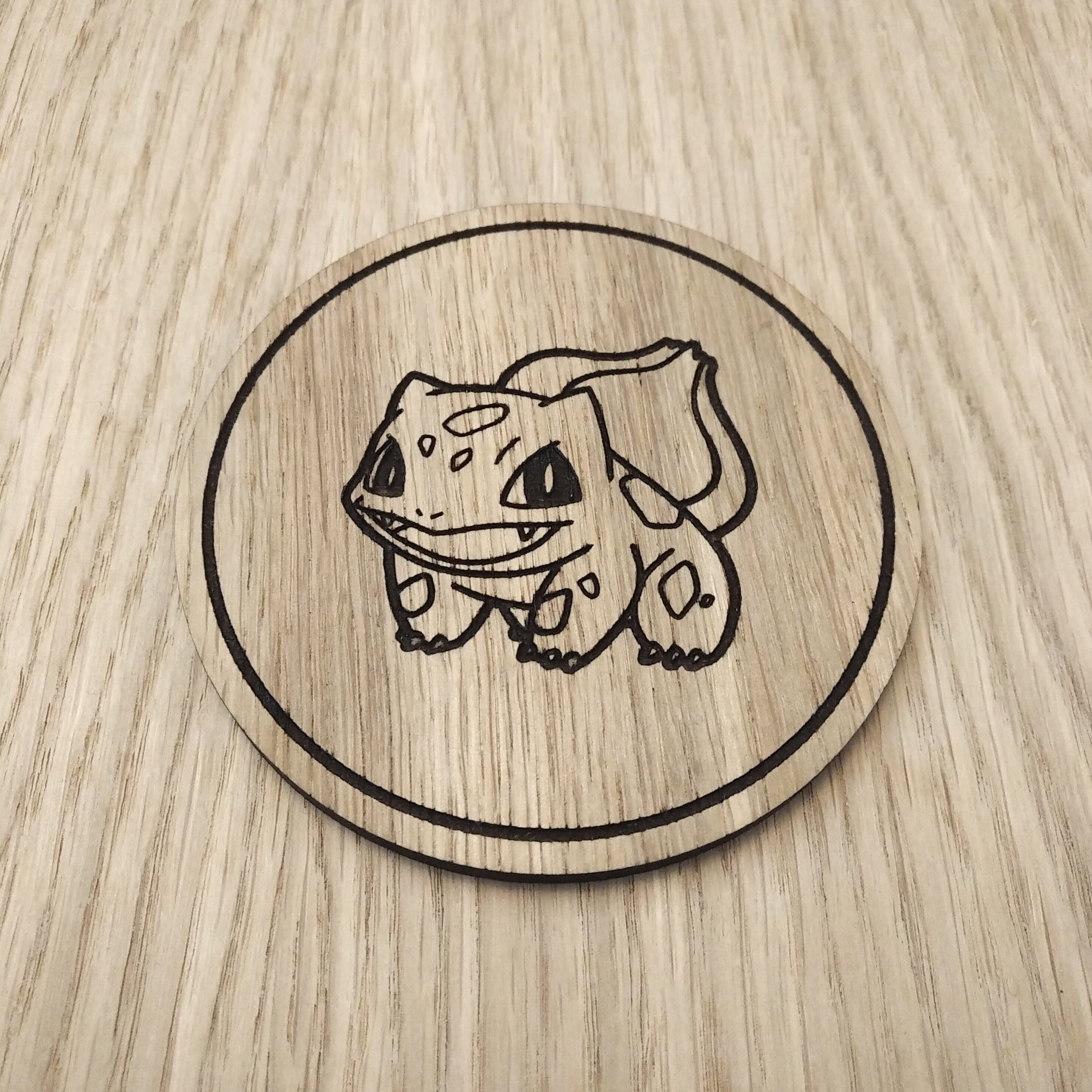 Laser cut wooden coaster. Bulbasaur