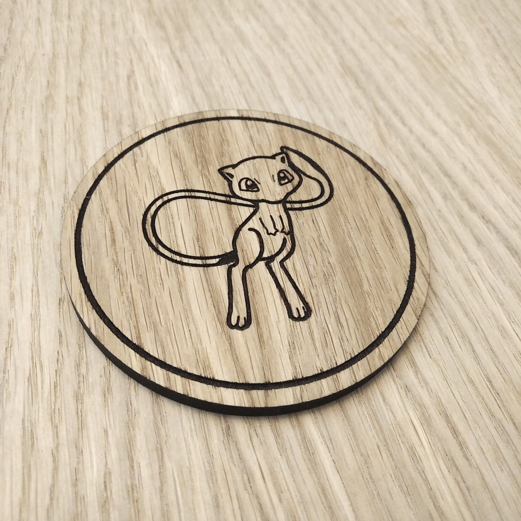 Laser cut wooden coaster. Mew