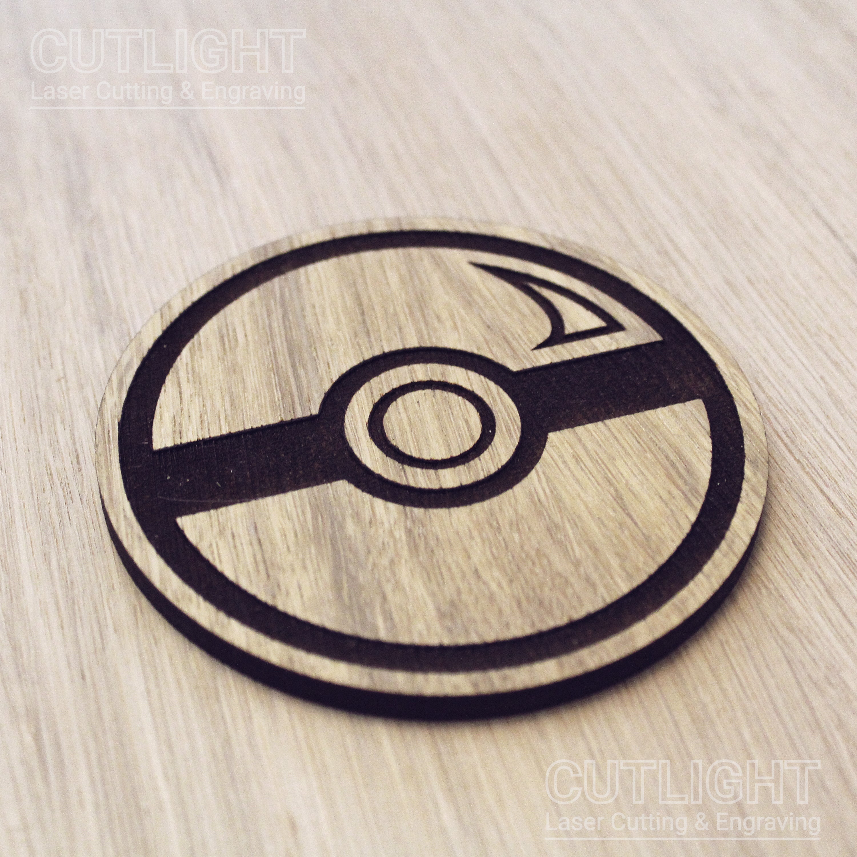 Laser cut wooden coaster. Ball