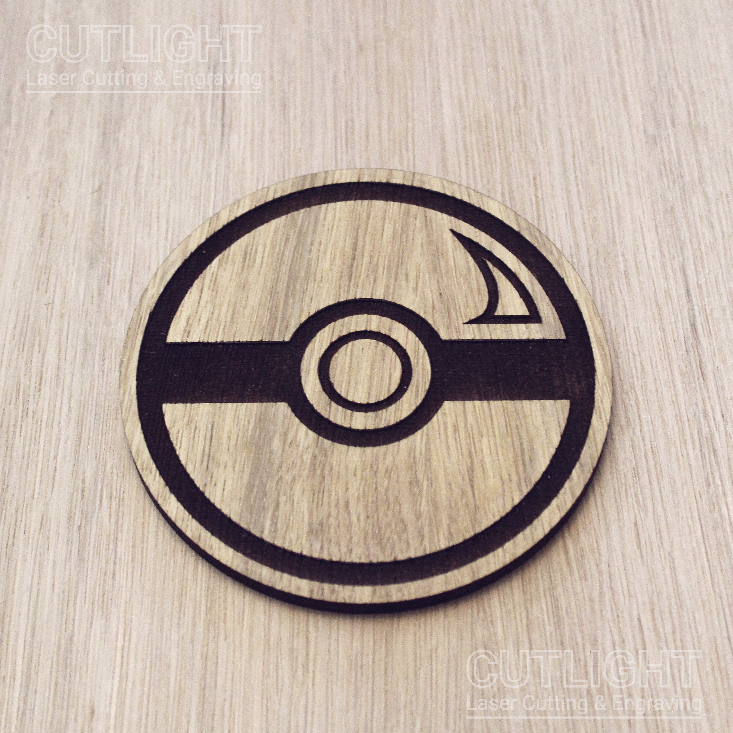 Laser cut wooden coaster. Ball