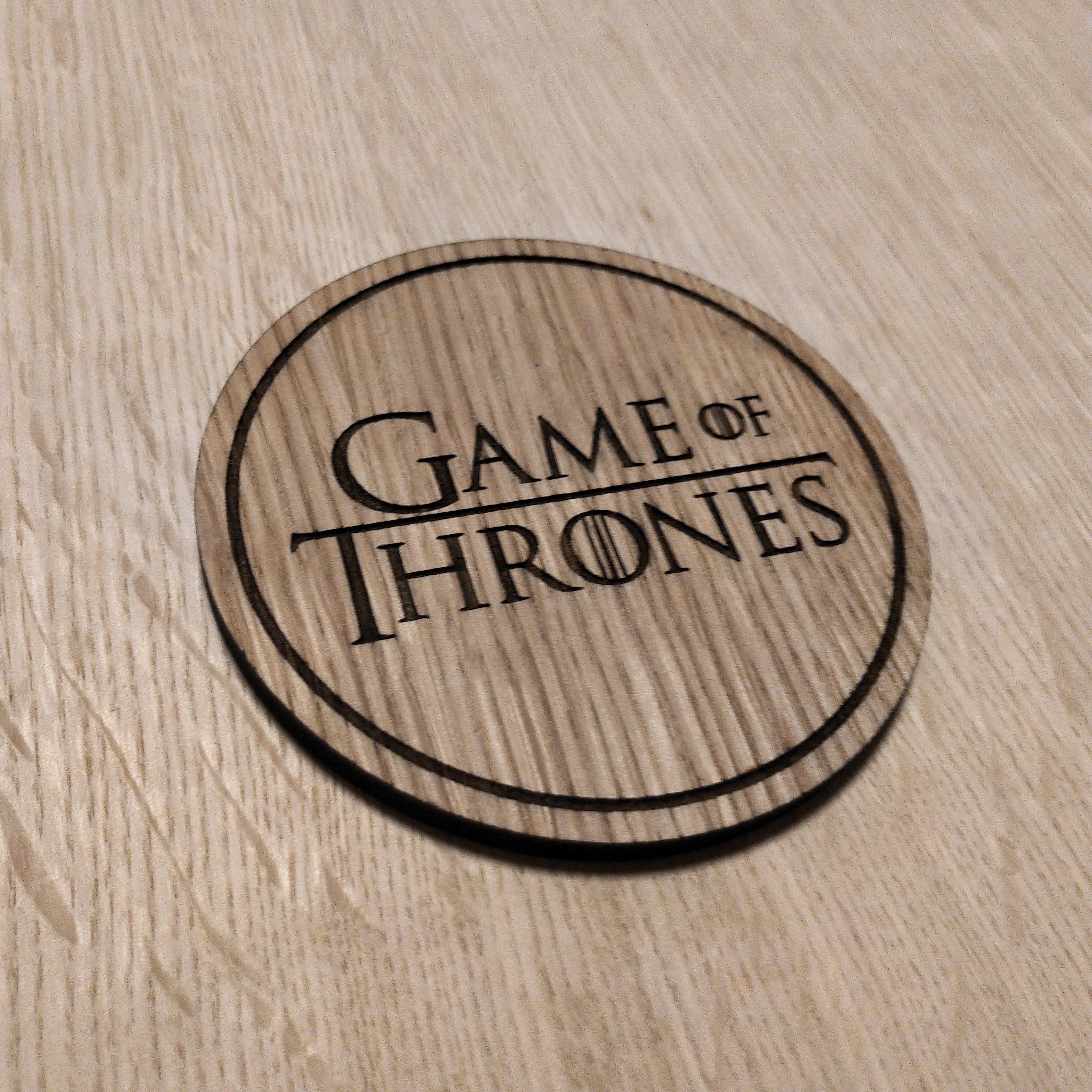 Laser cut wooden coaster.  Thrones