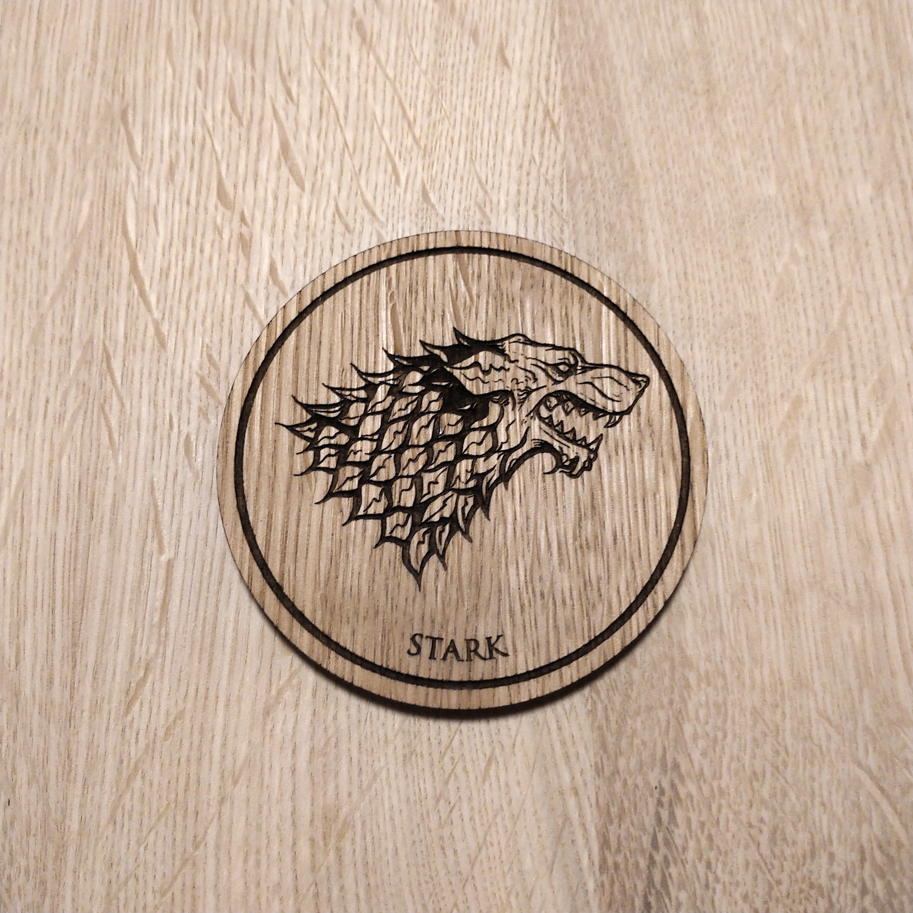 Laser cut wooden coaster. House Stark