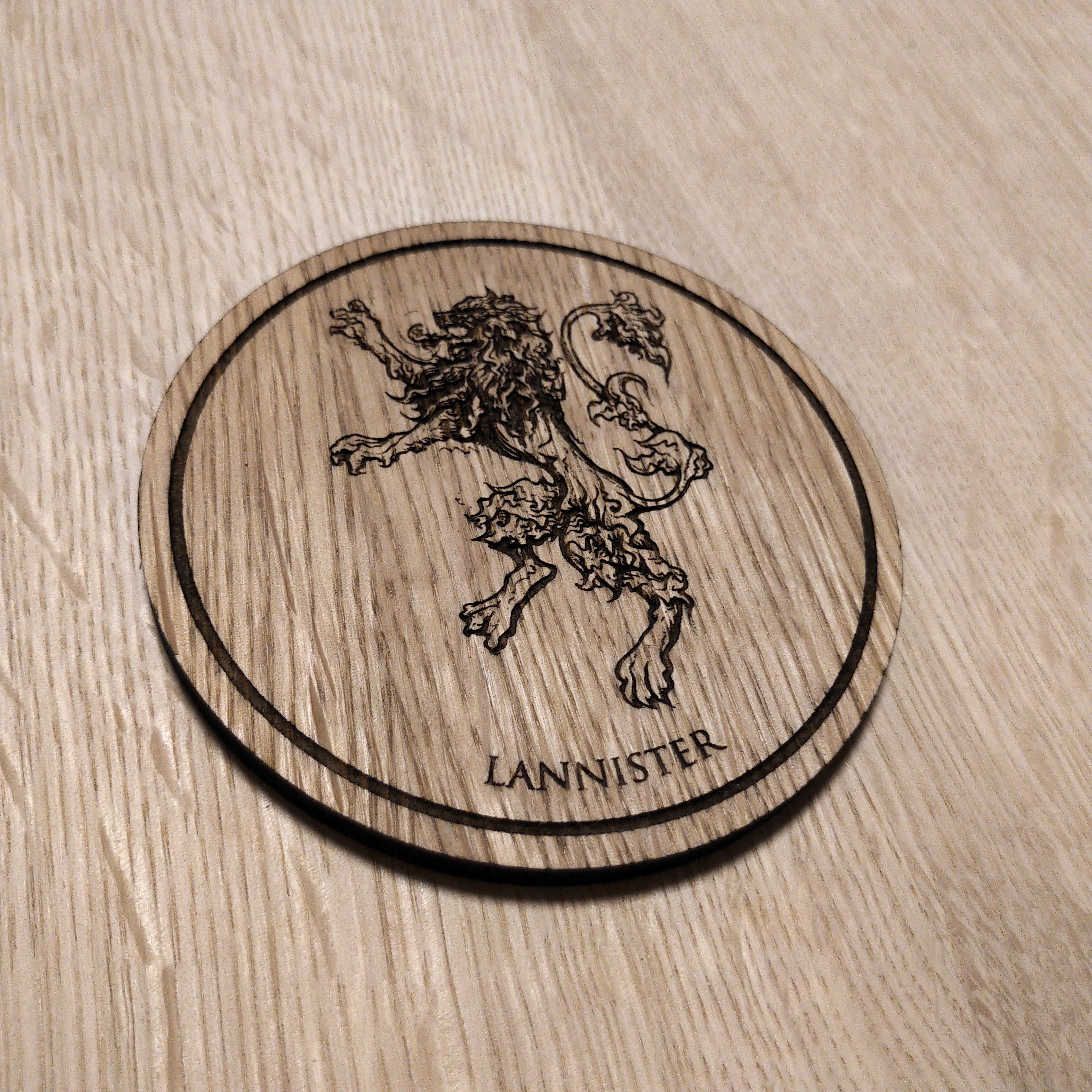 Laser cut wooden coaster.  House Lannister