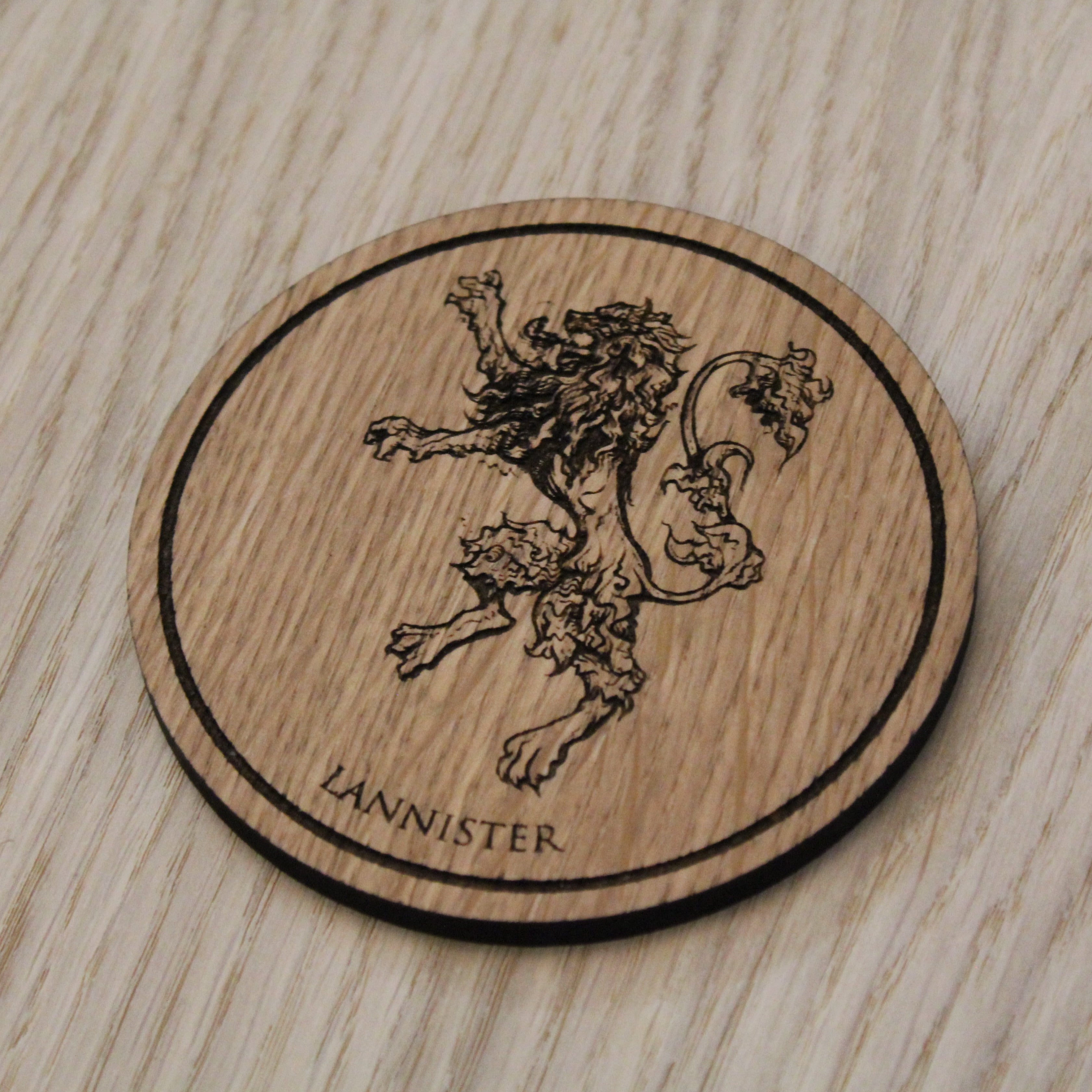 Laser cut wooden coaster.  House Lannister