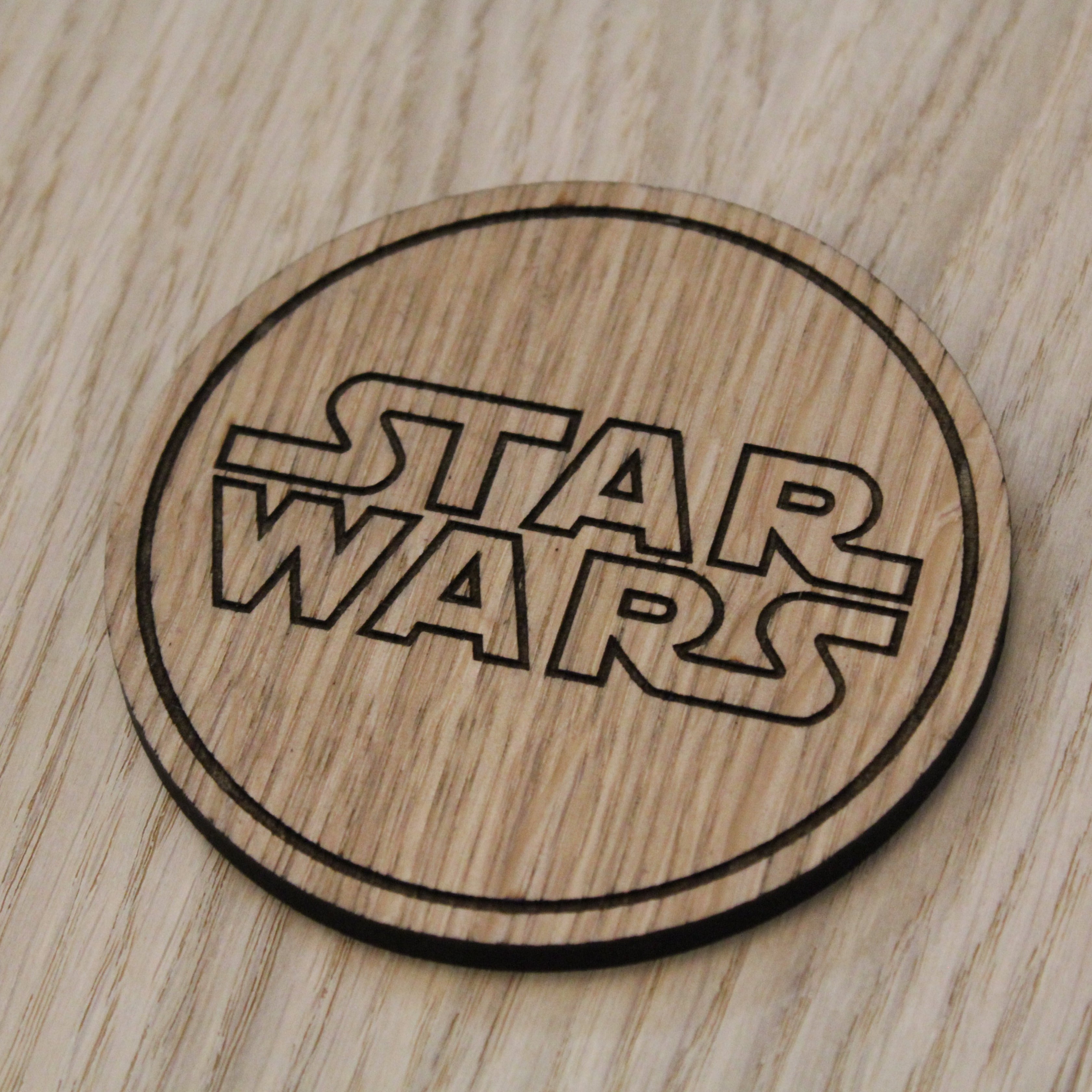 Laser cut wooden coaster. Space fan film