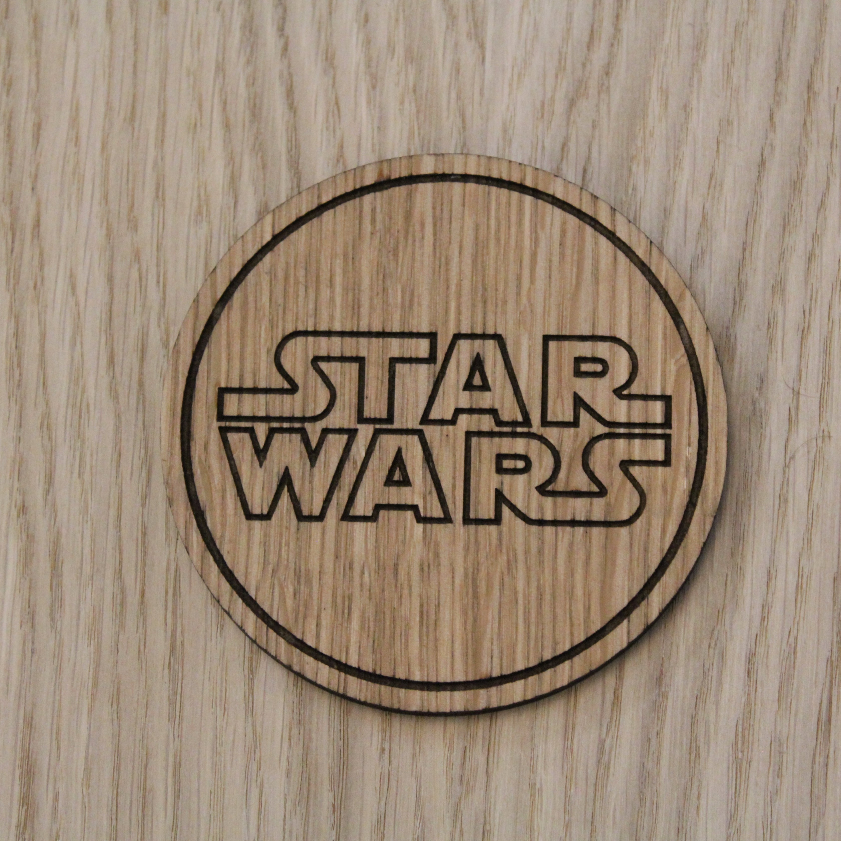 Laser cut wooden coaster. Space fan film
