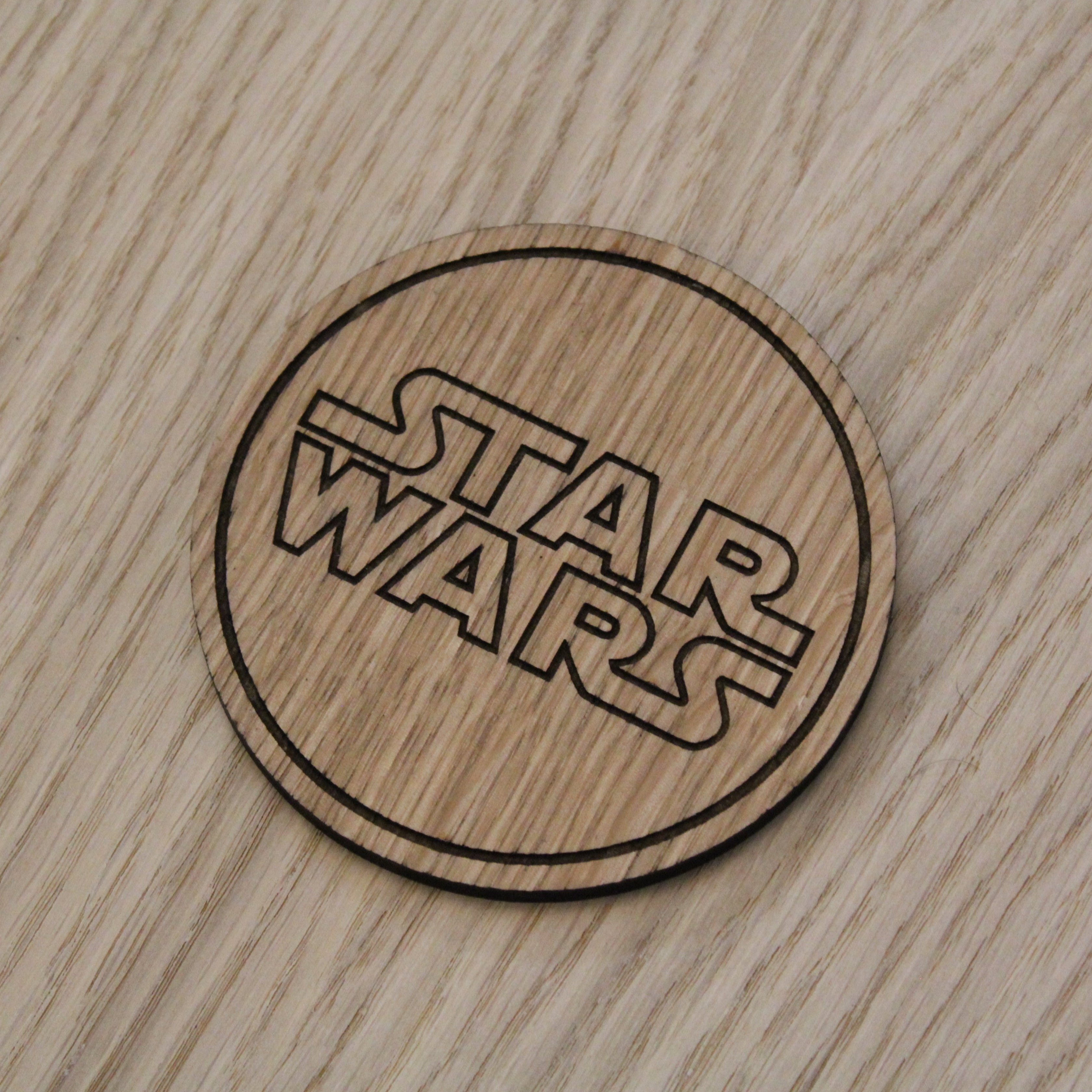Laser cut wooden coaster. Space fan film
